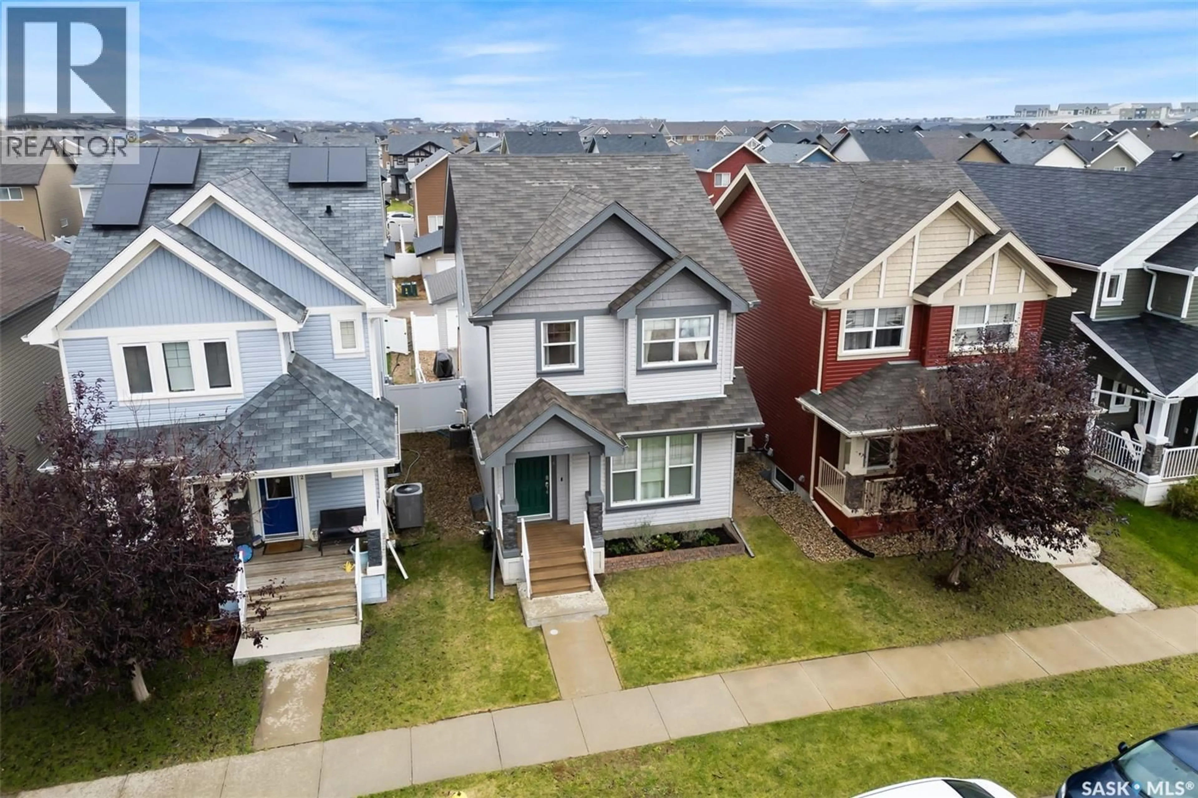 A pic from outside/outdoor area/front of a property/back of a property/a pic from drone, street for 3636 GREEN MOSS LANE, Regina Saskatchewan S4V1M2