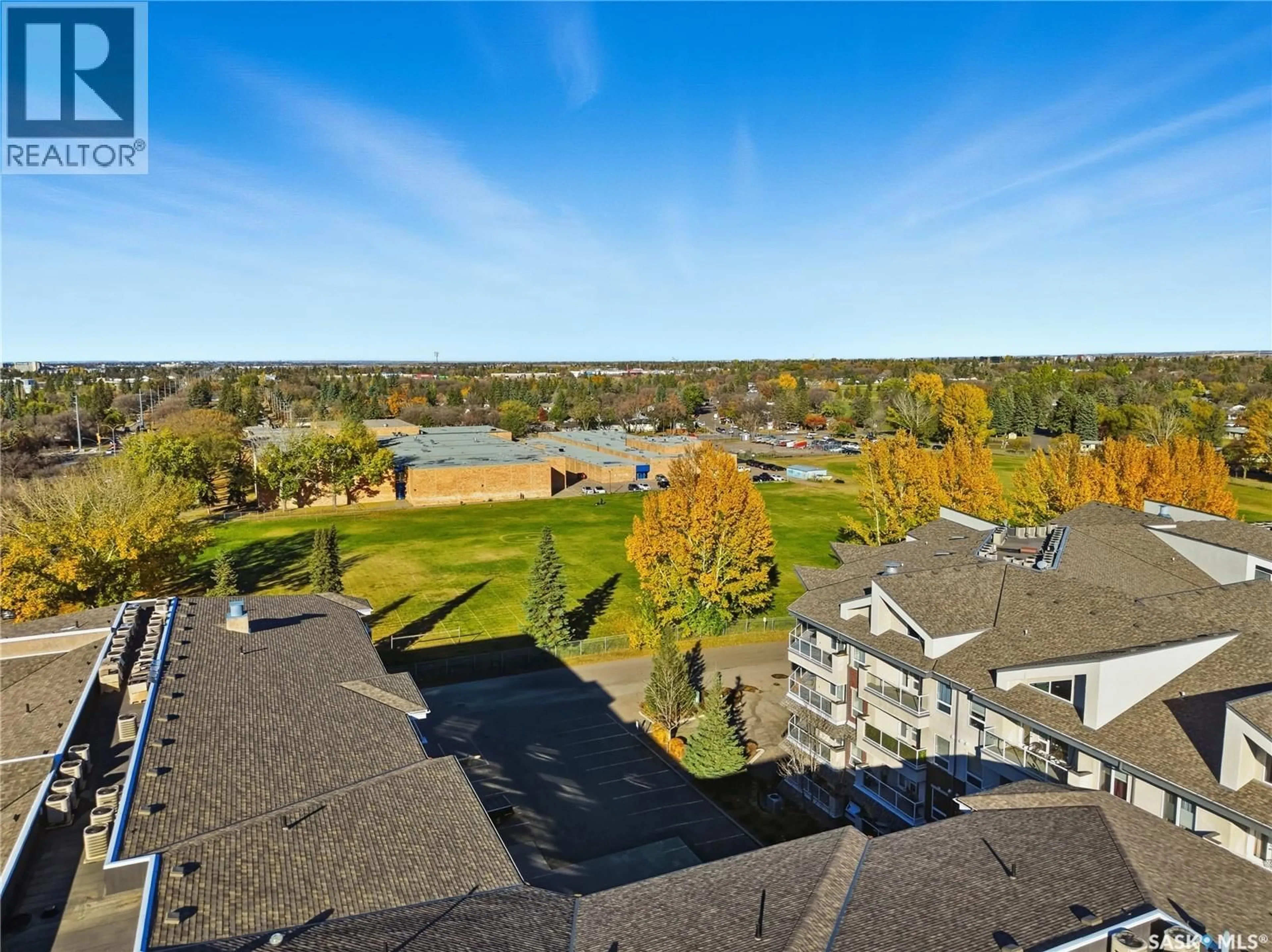 A pic from outside/outdoor area/front of a property/back of a property/a pic from drone, water/lake/river/ocean view for 204 - 102 ARMISTICE WAY, Saskatoon Saskatchewan S7J2Z6