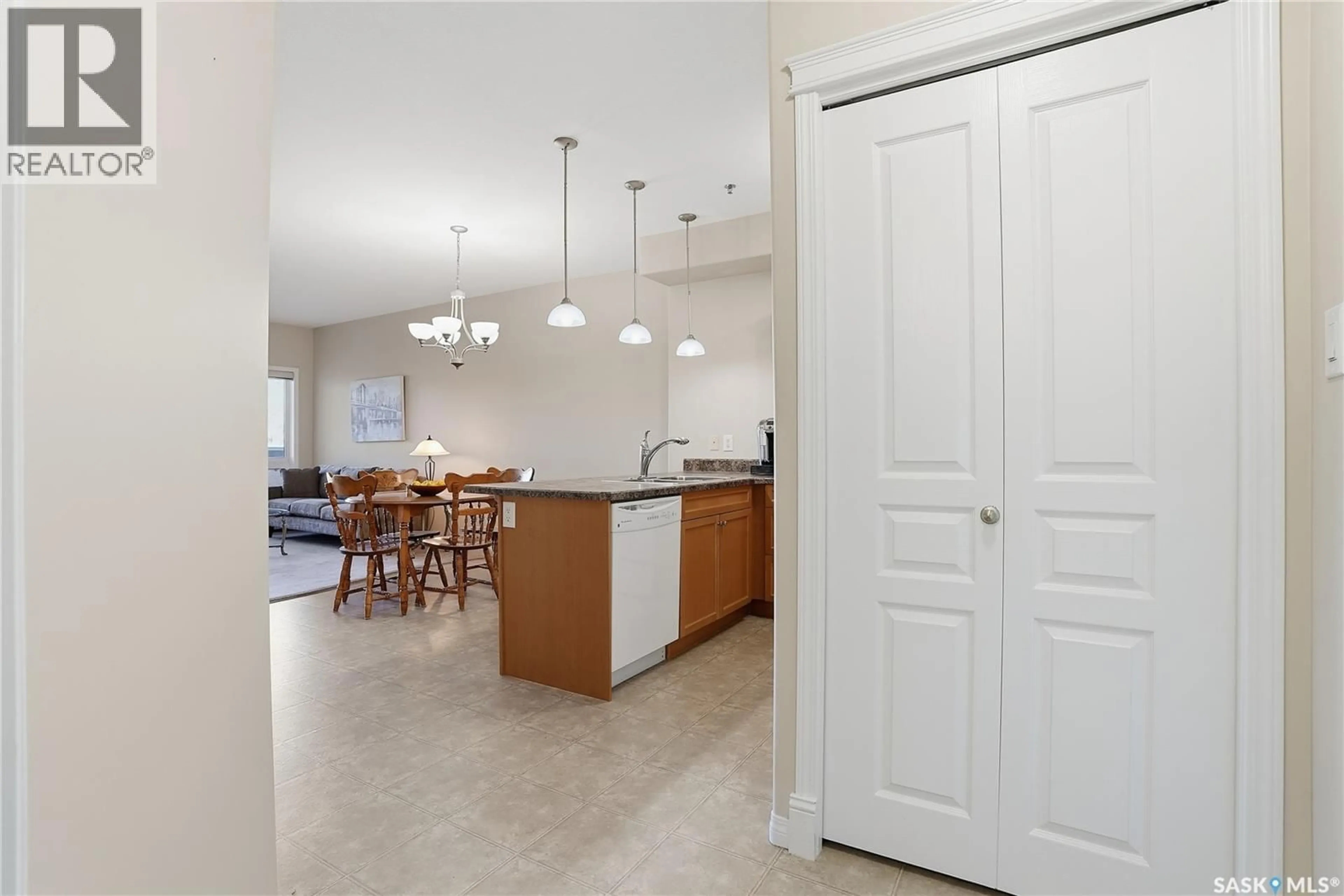Open concept kitchen, ceramic/tile floor for 204 - 102 ARMISTICE WAY, Saskatoon Saskatchewan S7J2Z6