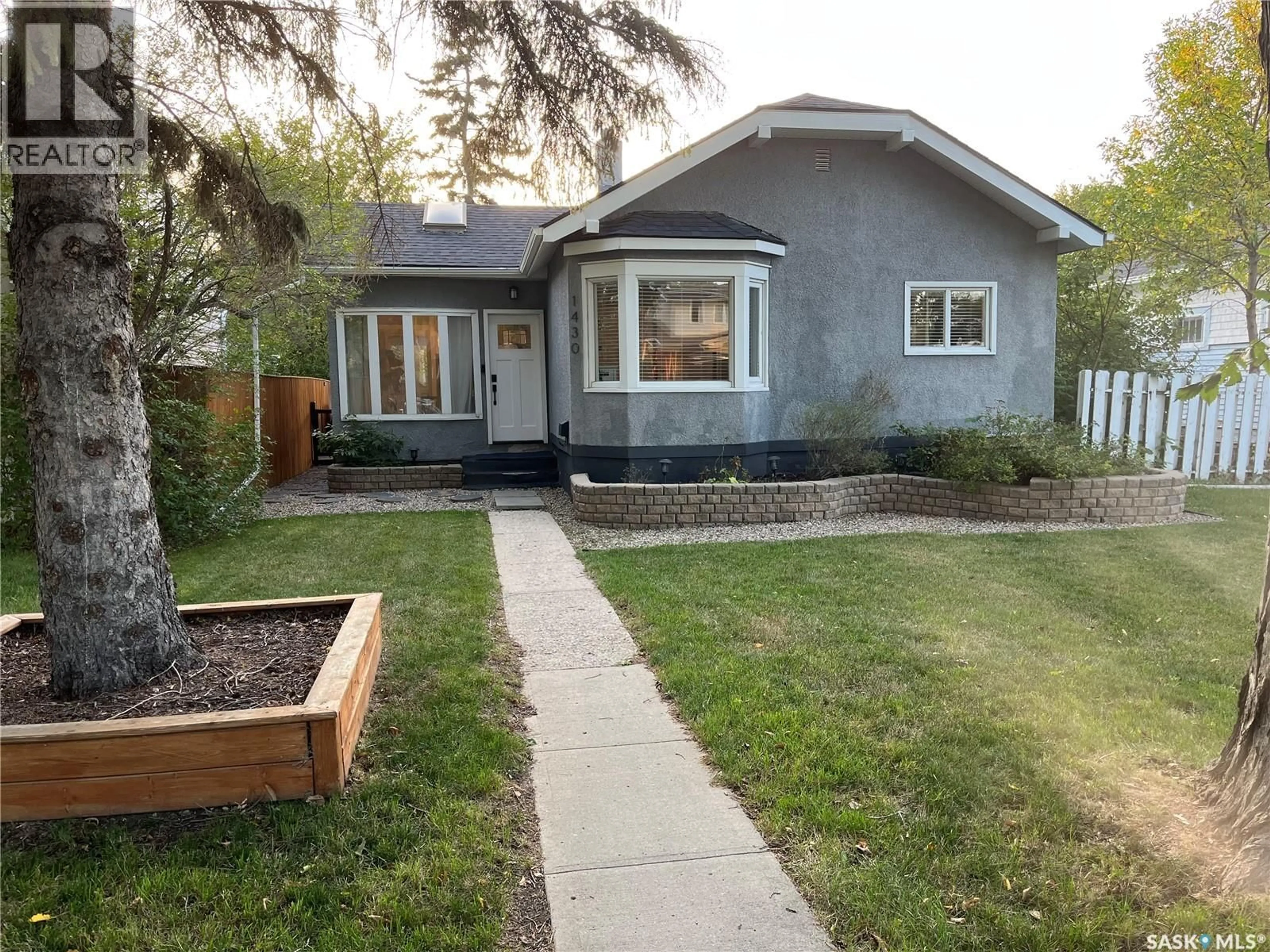 Home with vinyl exterior material, street for 1430 ROYAL STREET, Regina Saskatchewan S4T5A3