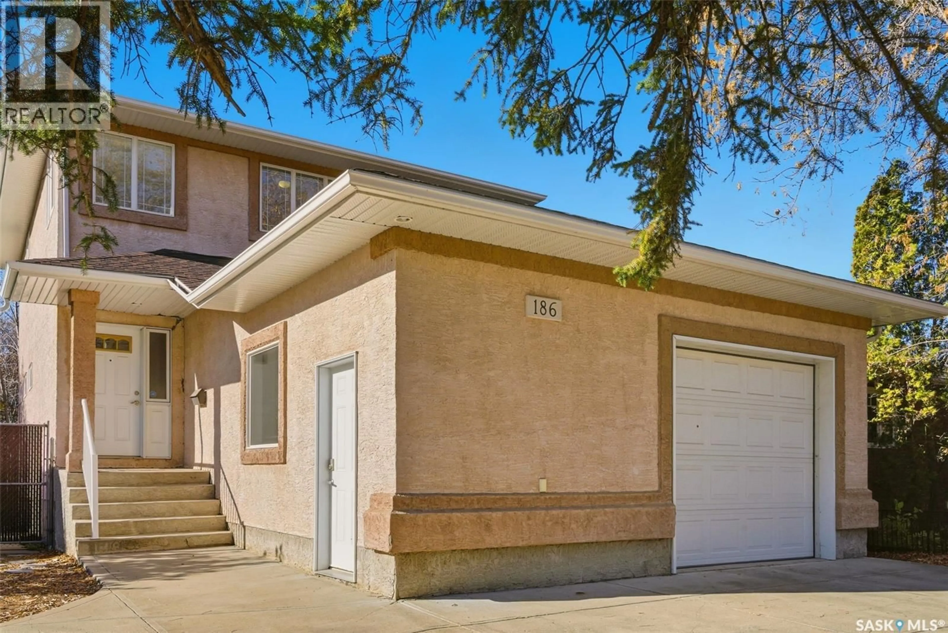 Home with brick exterior material, street for 186 MASSEY ROAD, Regina Saskatchewan S4S4N5