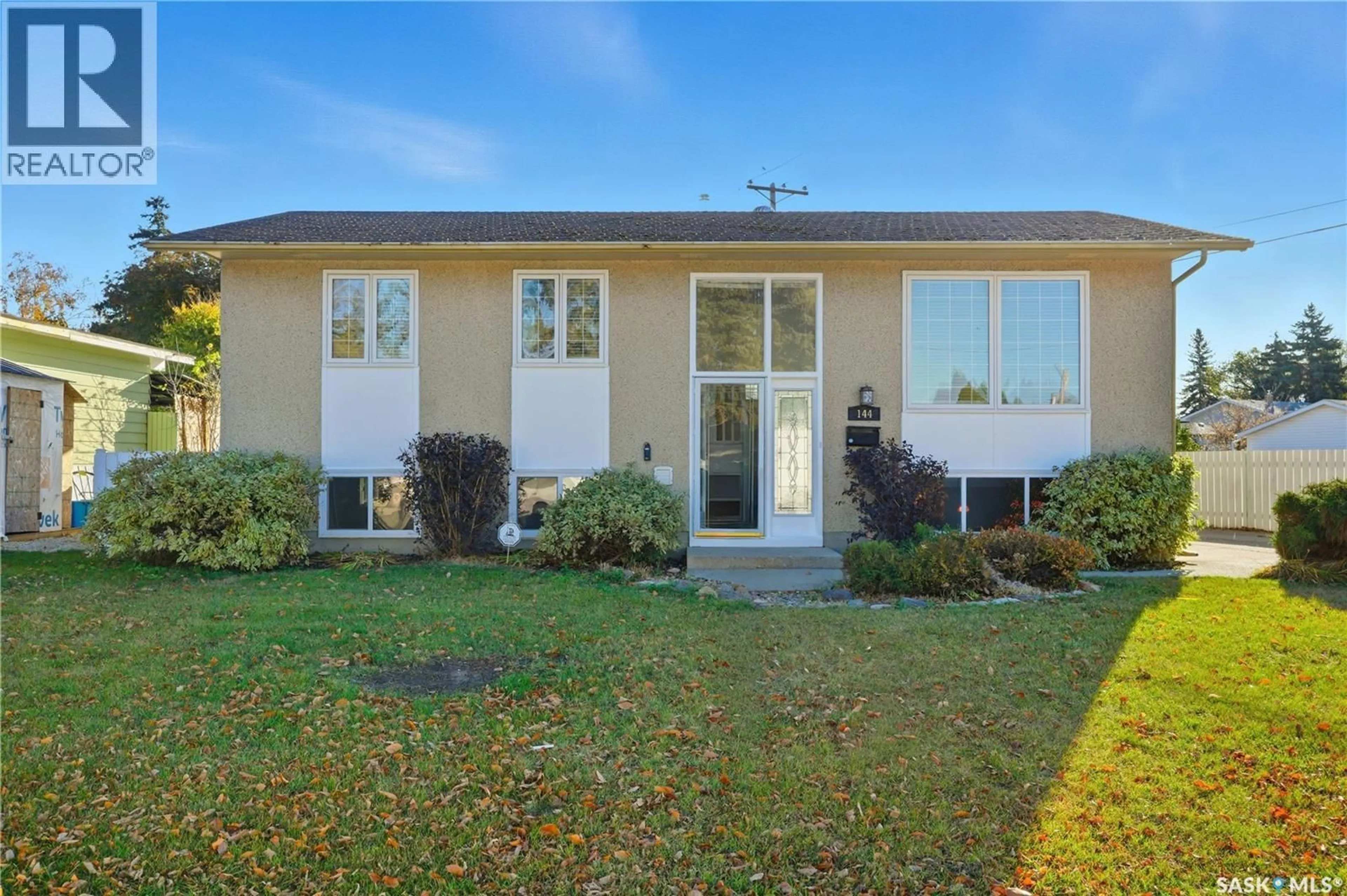 Home with vinyl exterior material, street for 144 MACLEAN CRESCENT, Saskatoon Saskatchewan S7J2R7