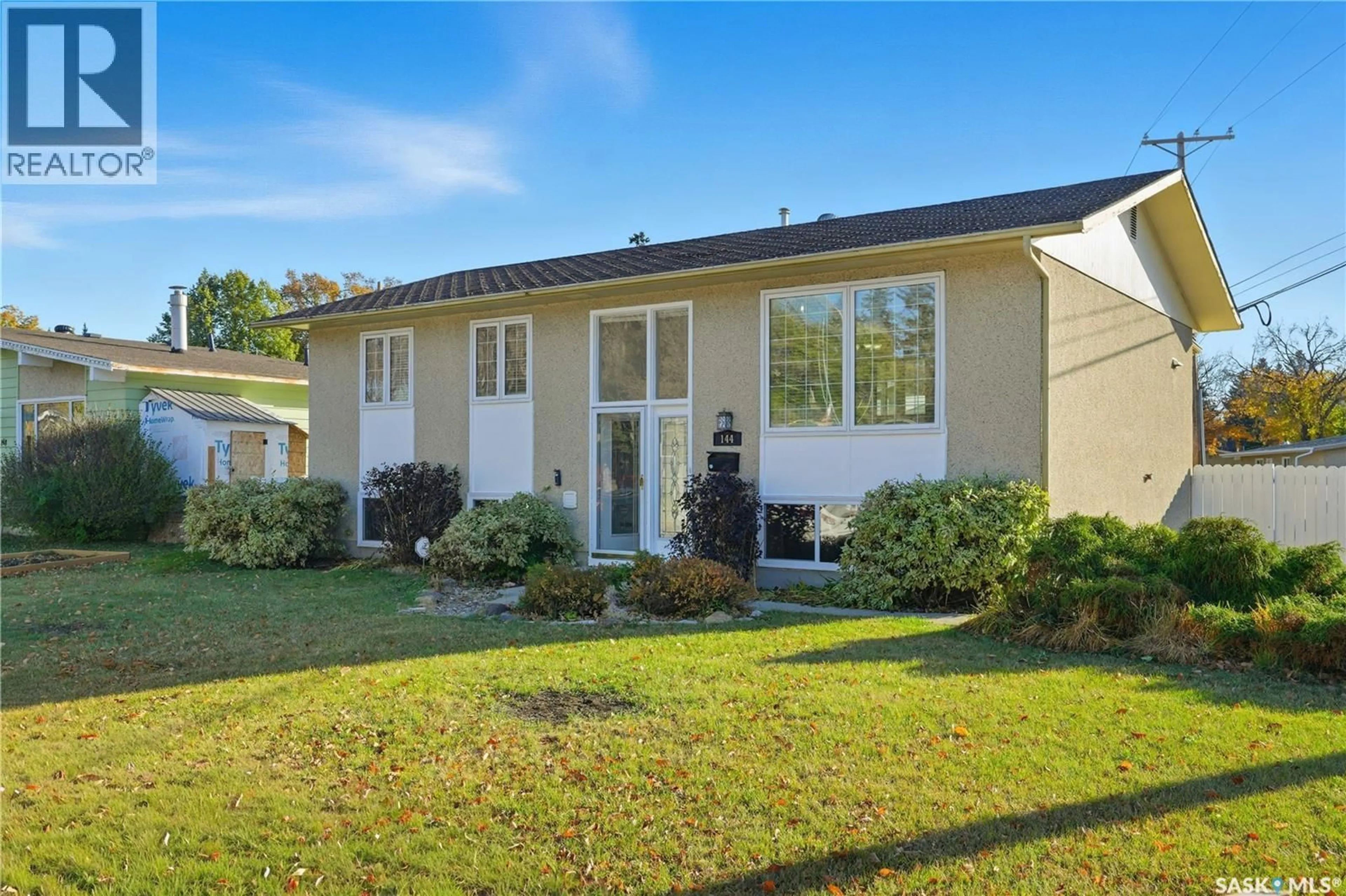 Home with vinyl exterior material, street for 144 MACLEAN CRESCENT, Saskatoon Saskatchewan S7J2R7