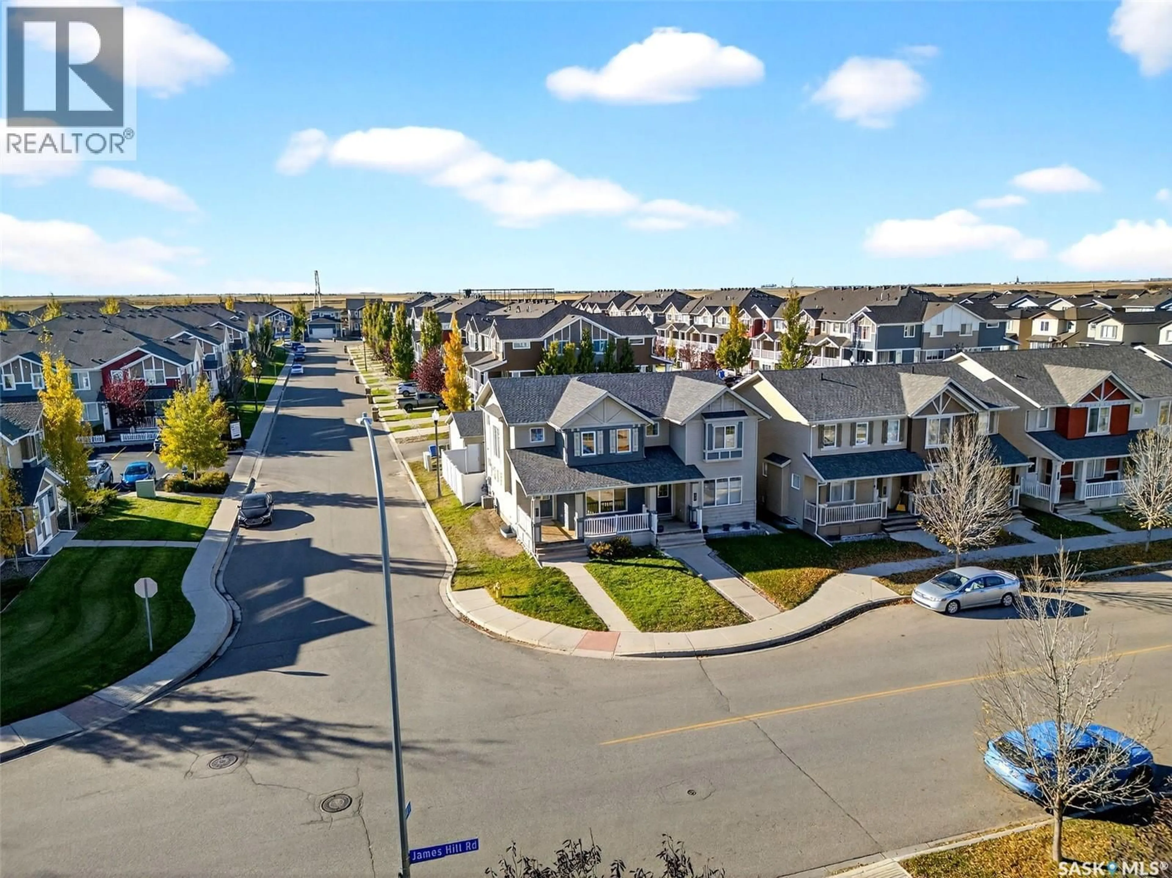 A pic from outside/outdoor area/front of a property/back of a property/a pic from drone, street for 4446 JAMES HILL ROAD, Regina Saskatchewan S4W0M5
