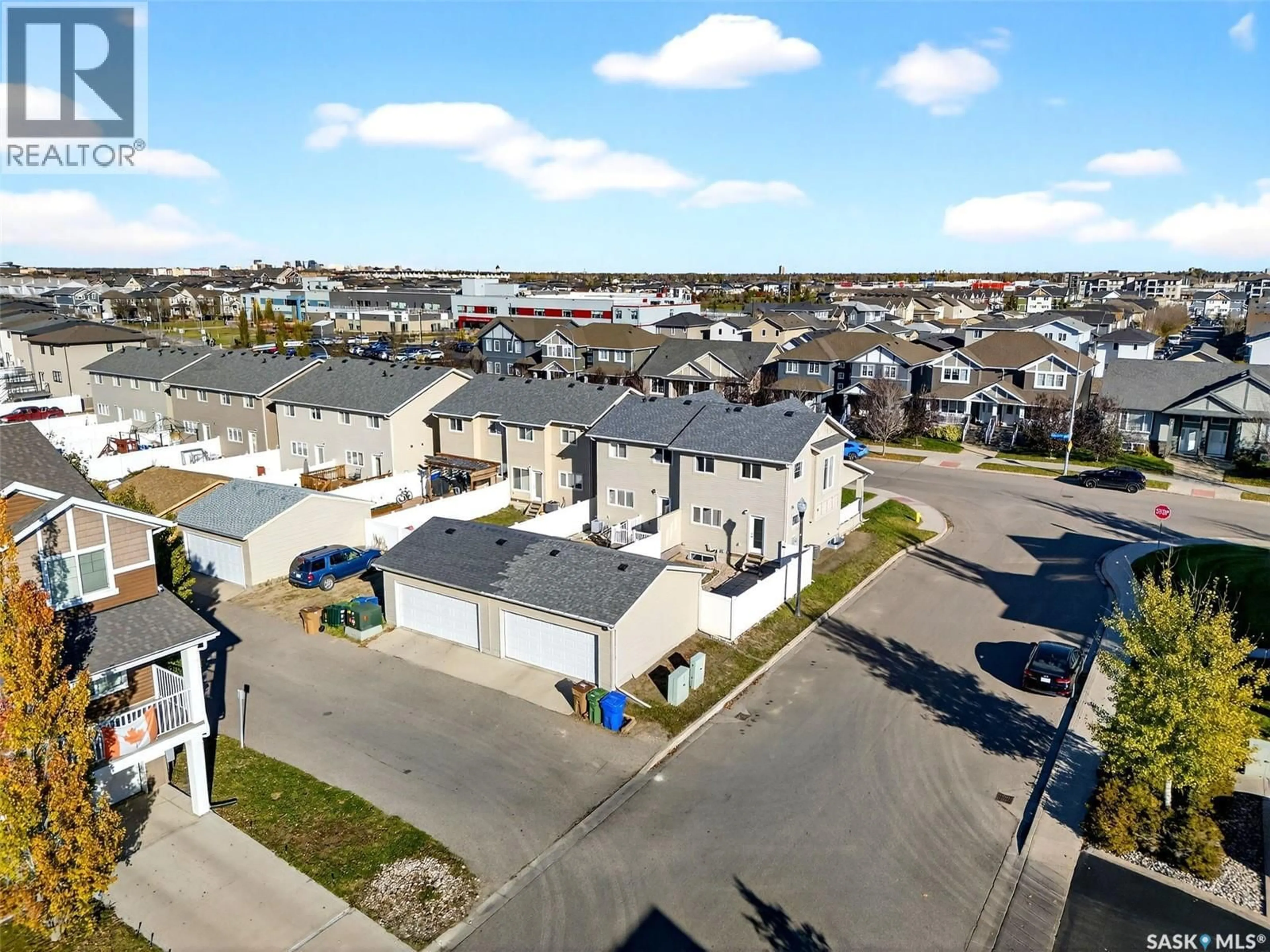 A pic from outside/outdoor area/front of a property/back of a property/a pic from drone, street for 4446 JAMES HILL ROAD, Regina Saskatchewan S4W0M5