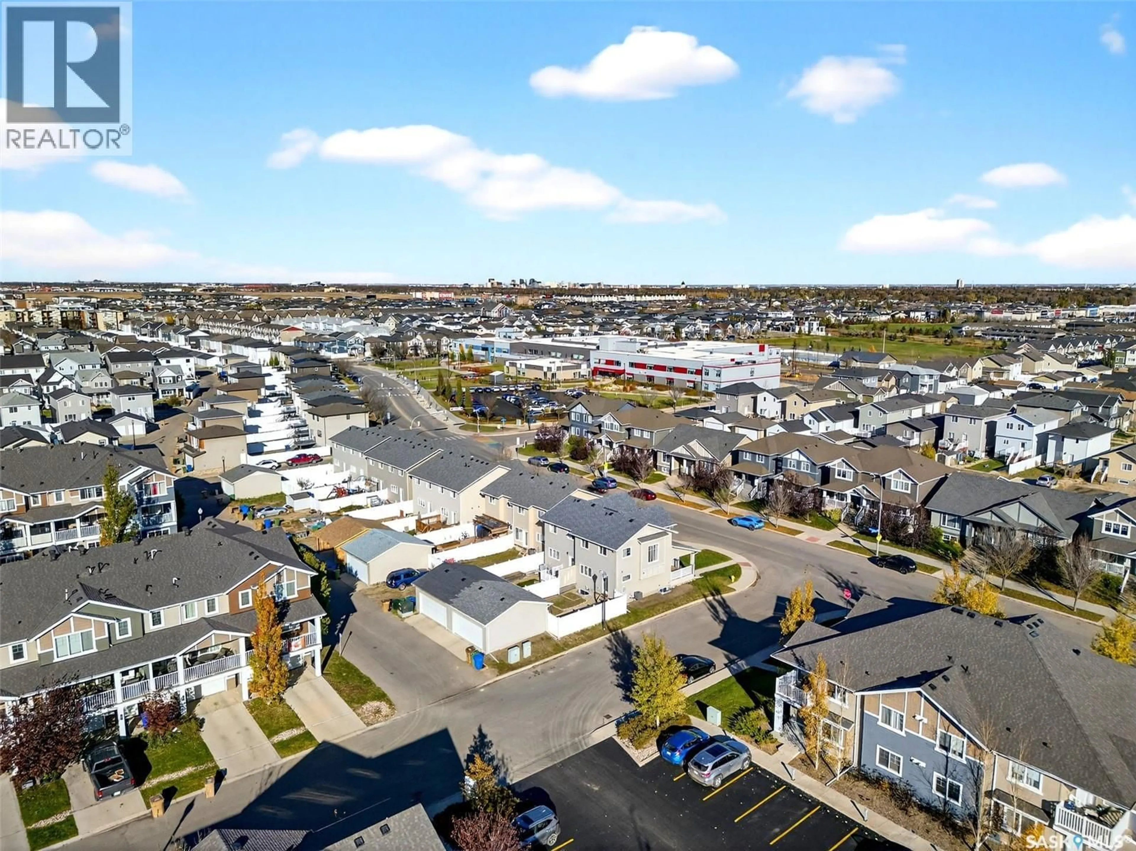 A pic from outside/outdoor area/front of a property/back of a property/a pic from drone, street for 4446 JAMES HILL ROAD, Regina Saskatchewan S4W0M5