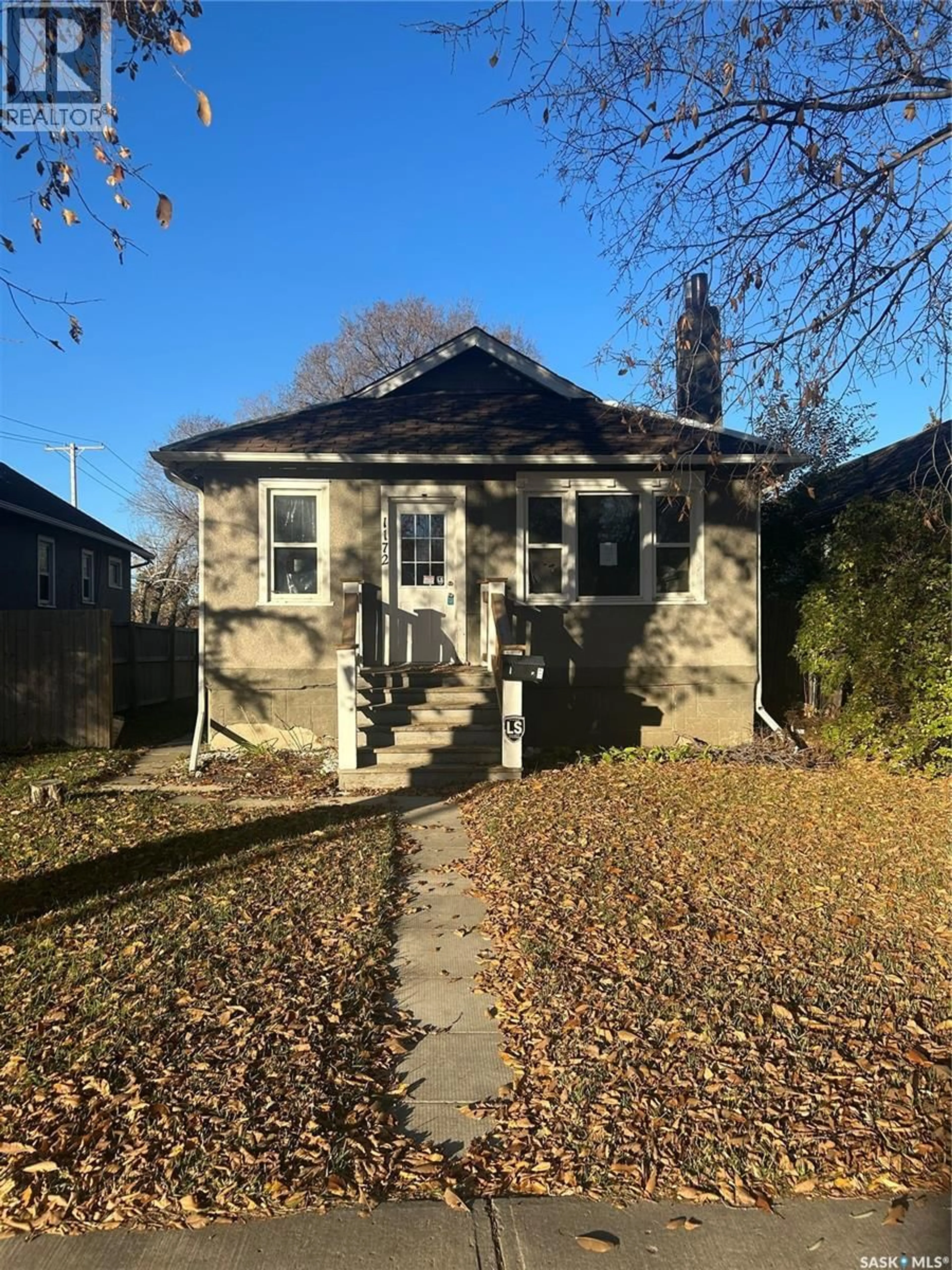 Home with brick exterior material, street for 1172 ATHOL STREET, Regina Saskatchewan S4T3C2