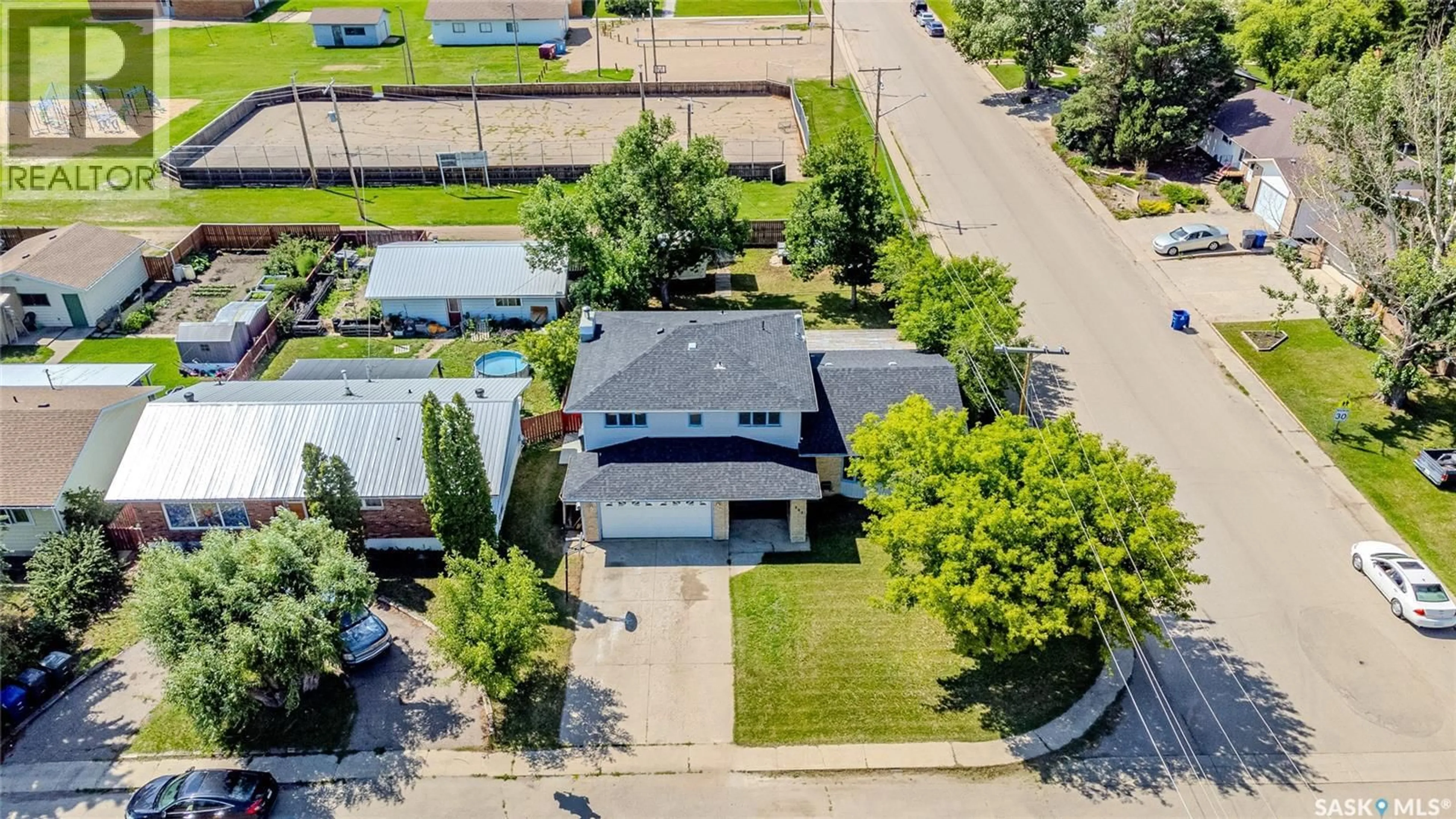 A pic from outside/outdoor area/front of a property/back of a property/a pic from drone, street for 302 4TH AVENUE, Langham Saskatchewan S0K2L0