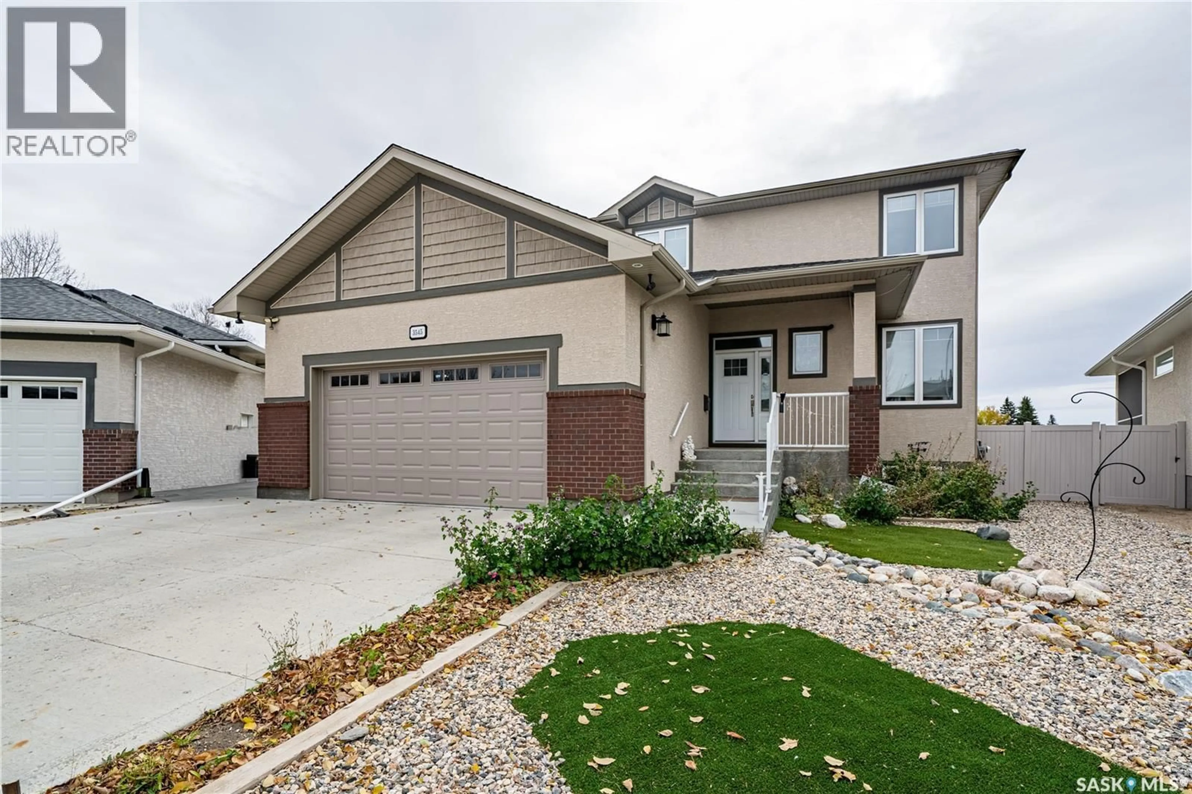 Home with vinyl exterior material, street for 3545 EVANS COURT, Regina Saskatchewan S4S0A9