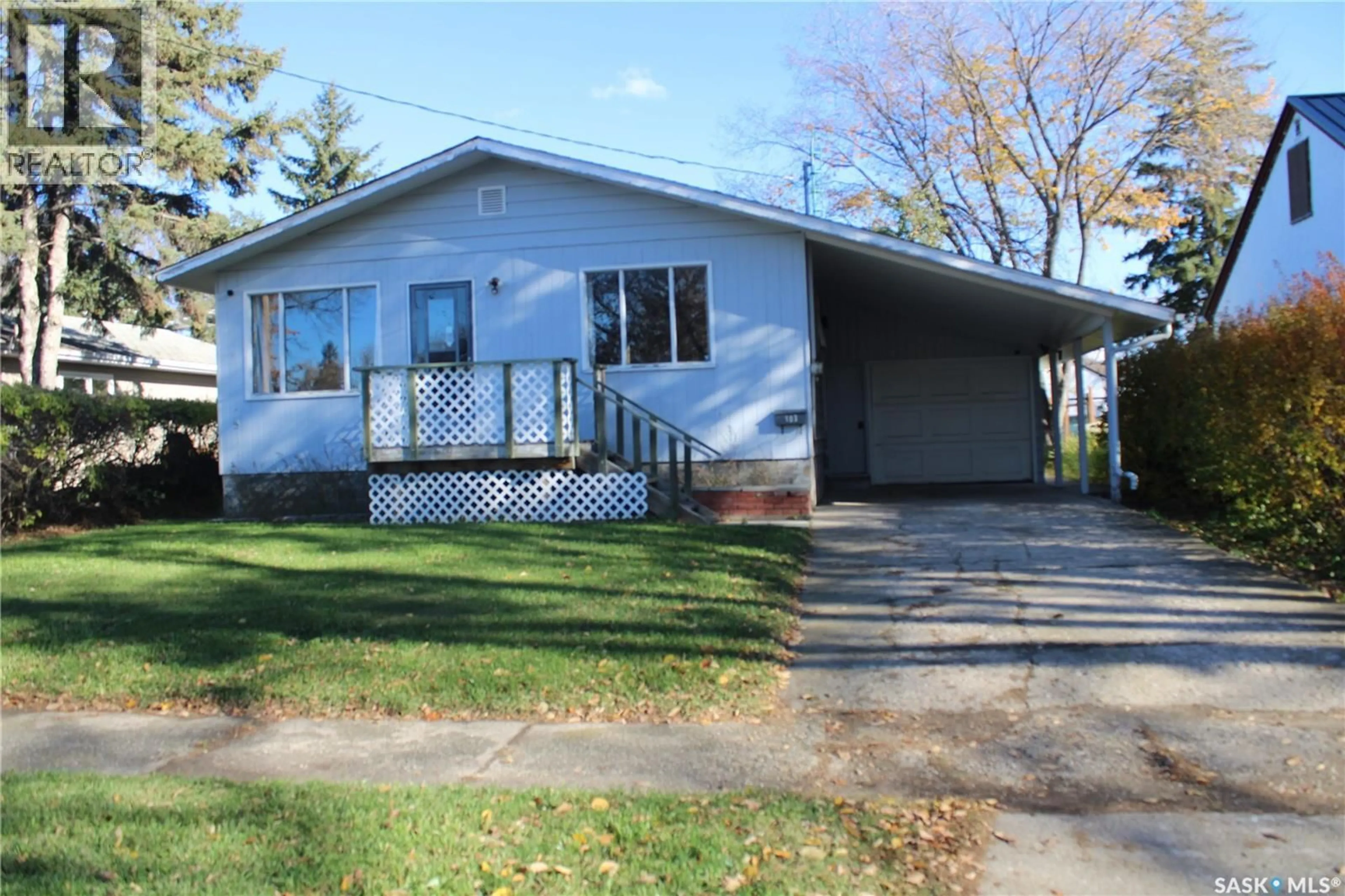 Home with vinyl exterior material, street for 103 WELLINGTON AVENUE, Yorkton Saskatchewan S3N1Y1