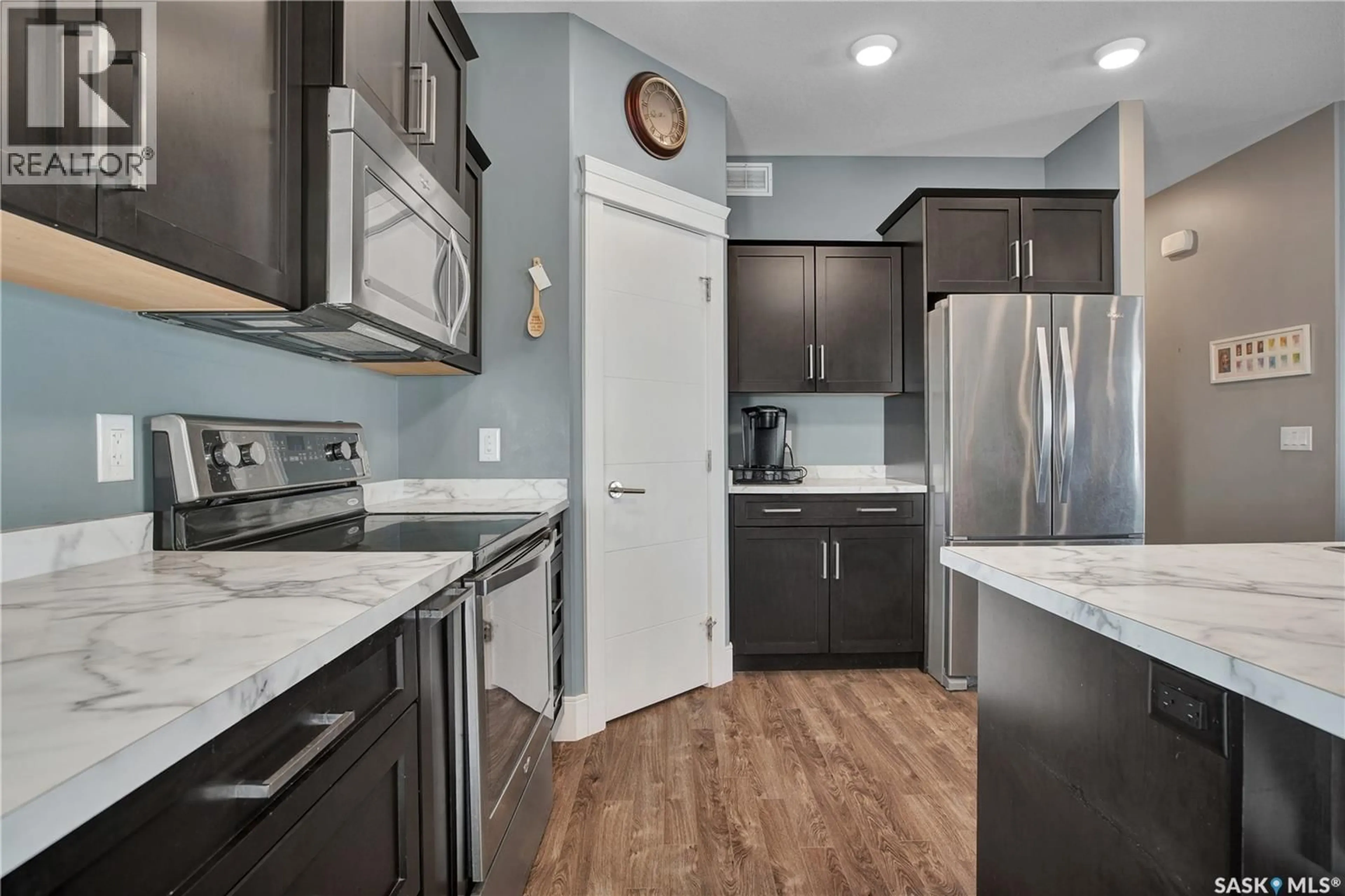 Open concept kitchen, ceramic/tile floor for 230 BAYCROFT DRIVE, Martensville Saskatchewan S0K2T2
