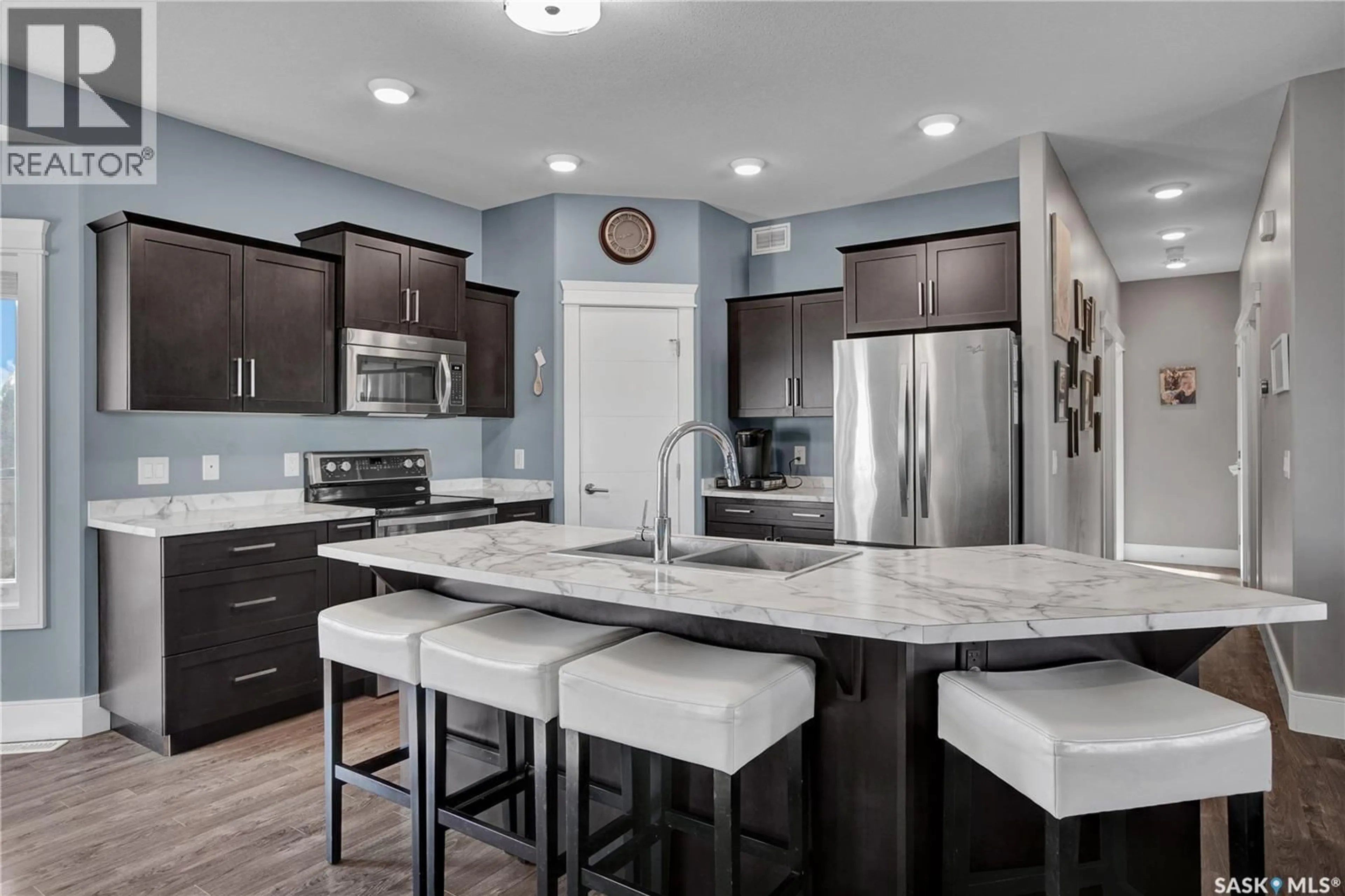 Open concept kitchen, ceramic/tile floor for 230 BAYCROFT DRIVE, Martensville Saskatchewan S0K2T2