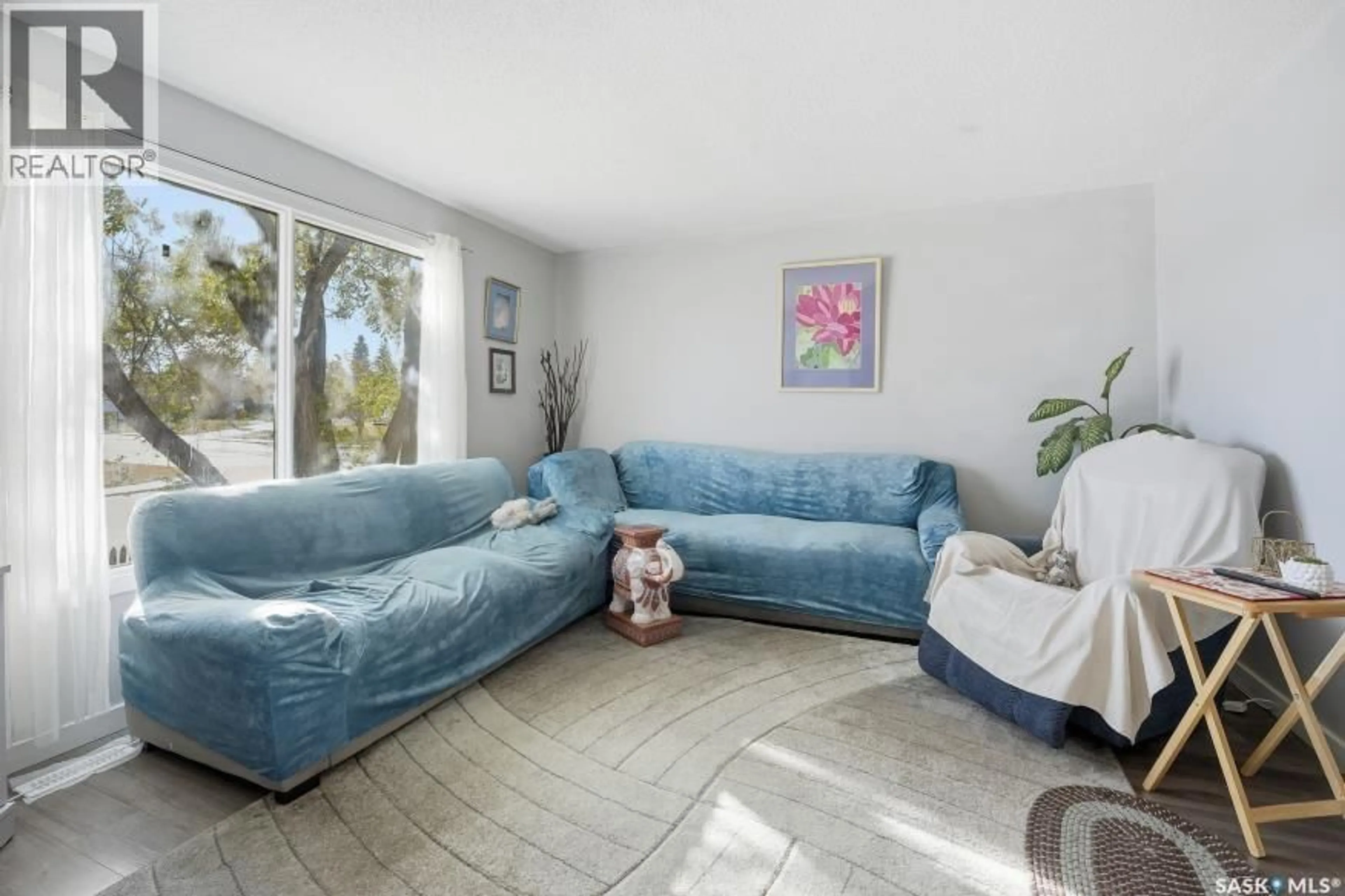 Living room with furniture, unknown for 138-140 CLANCY DRIVE, Saskatoon Saskatchewan S7M4L2