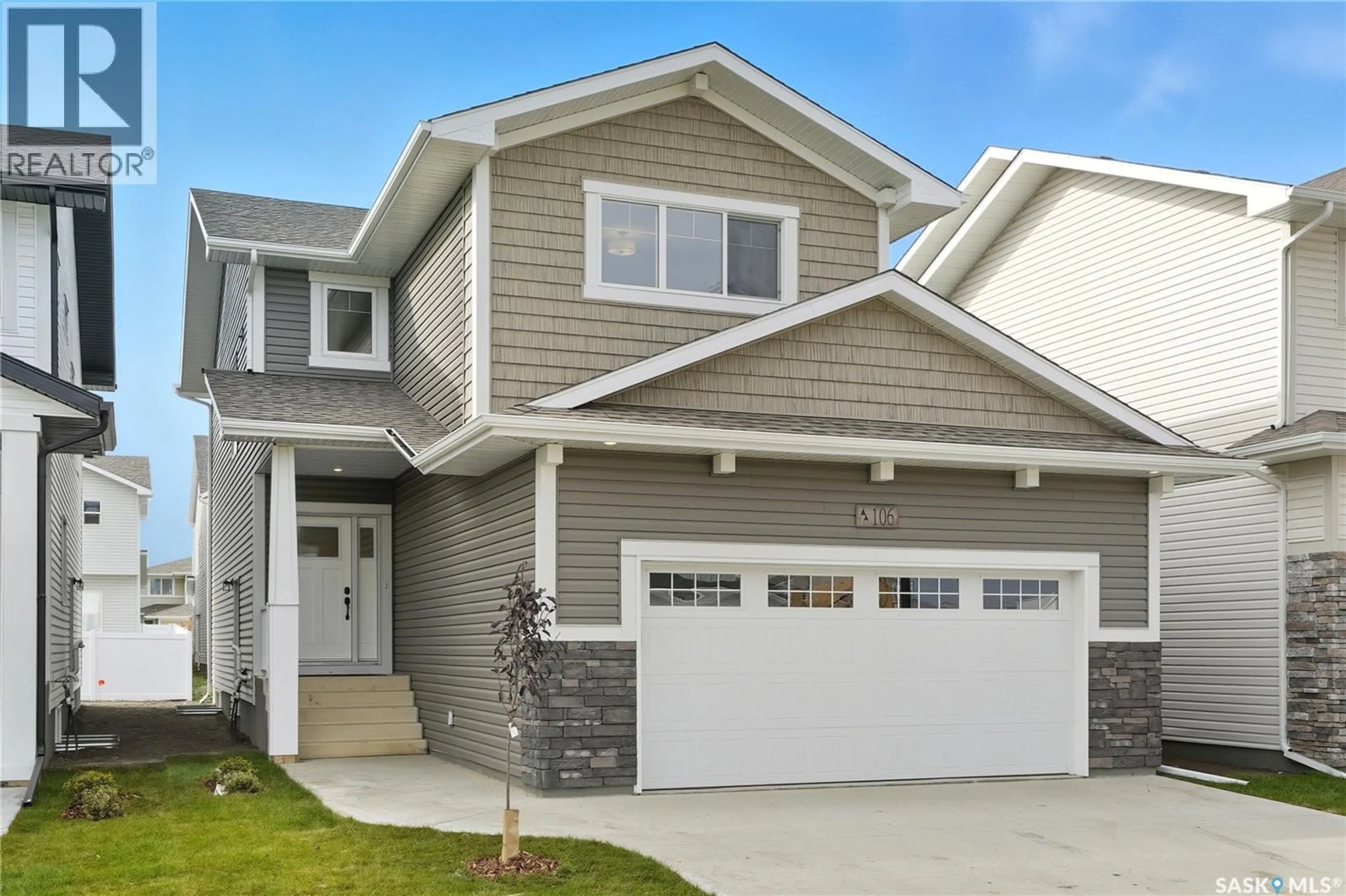 Home with vinyl exterior material, street for 106 KATZ AVENUE, Saskatoon Saskatchewan S7V1S9