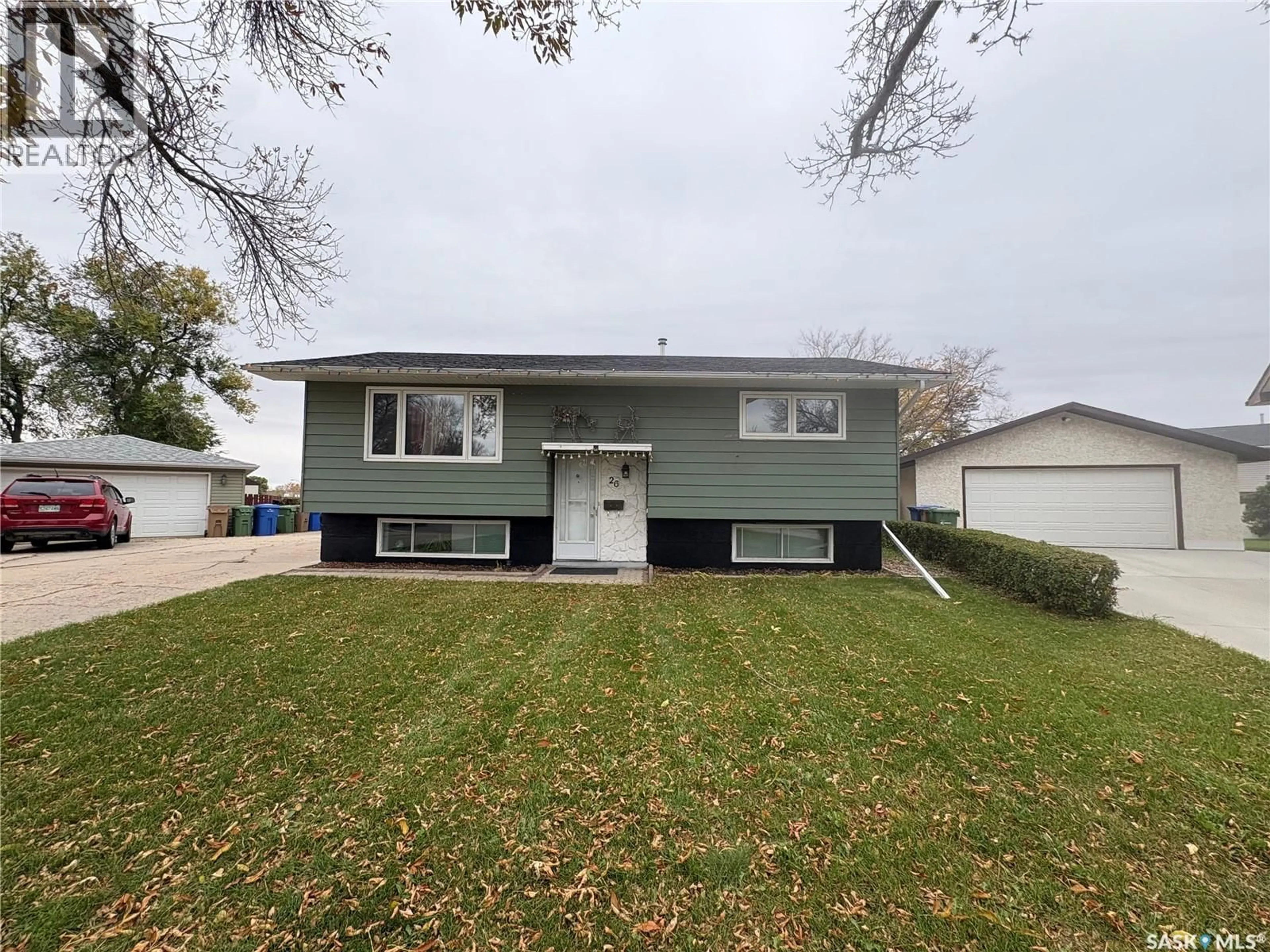 Home with vinyl exterior material, street for 26 BEDFORD CRESCENT, Regina Saskatchewan S4N1M8