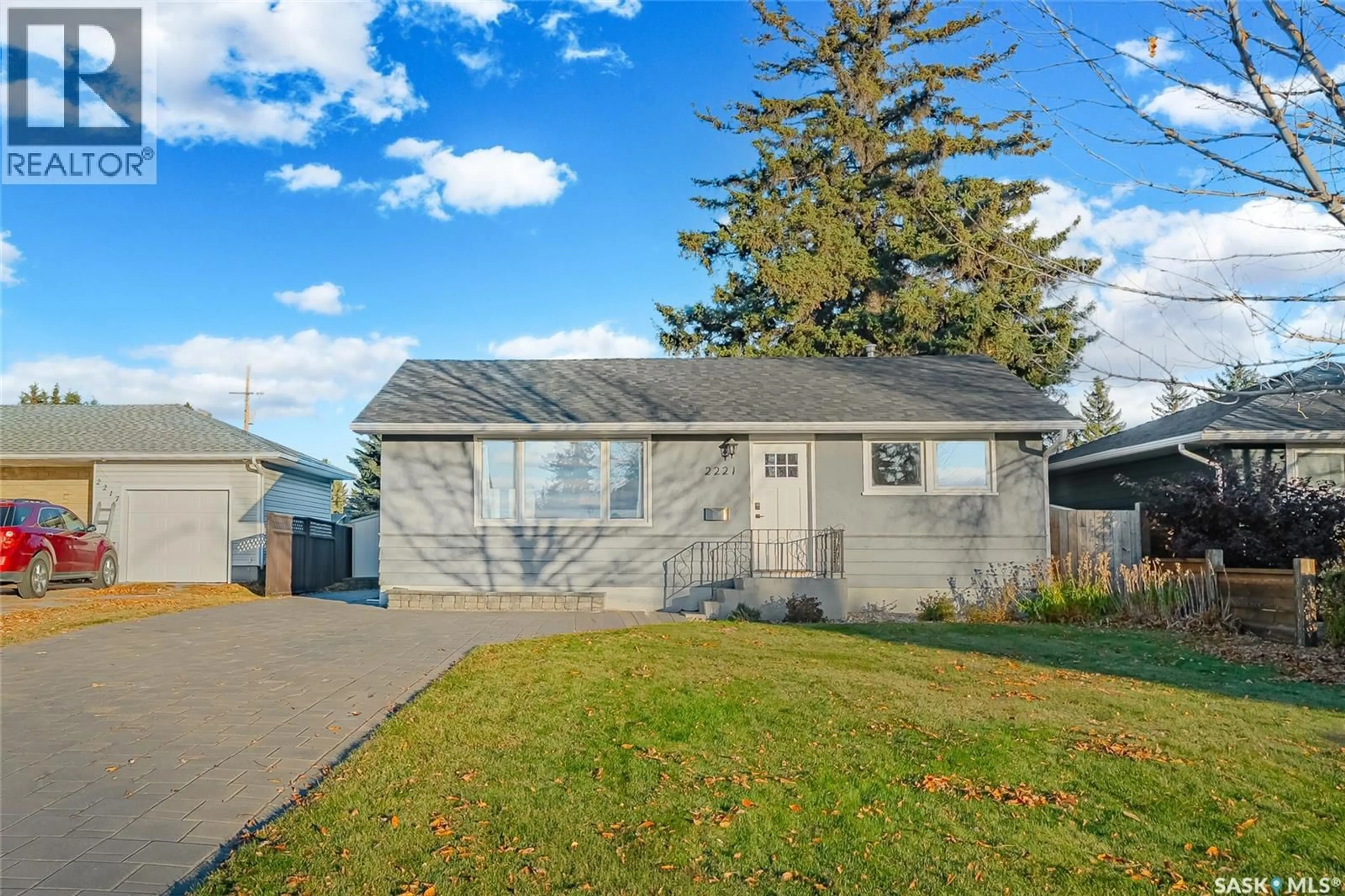 Home with vinyl exterior material, street for 2221 HAULTAIN AVENUE, Saskatoon Saskatchewan S7J1P7