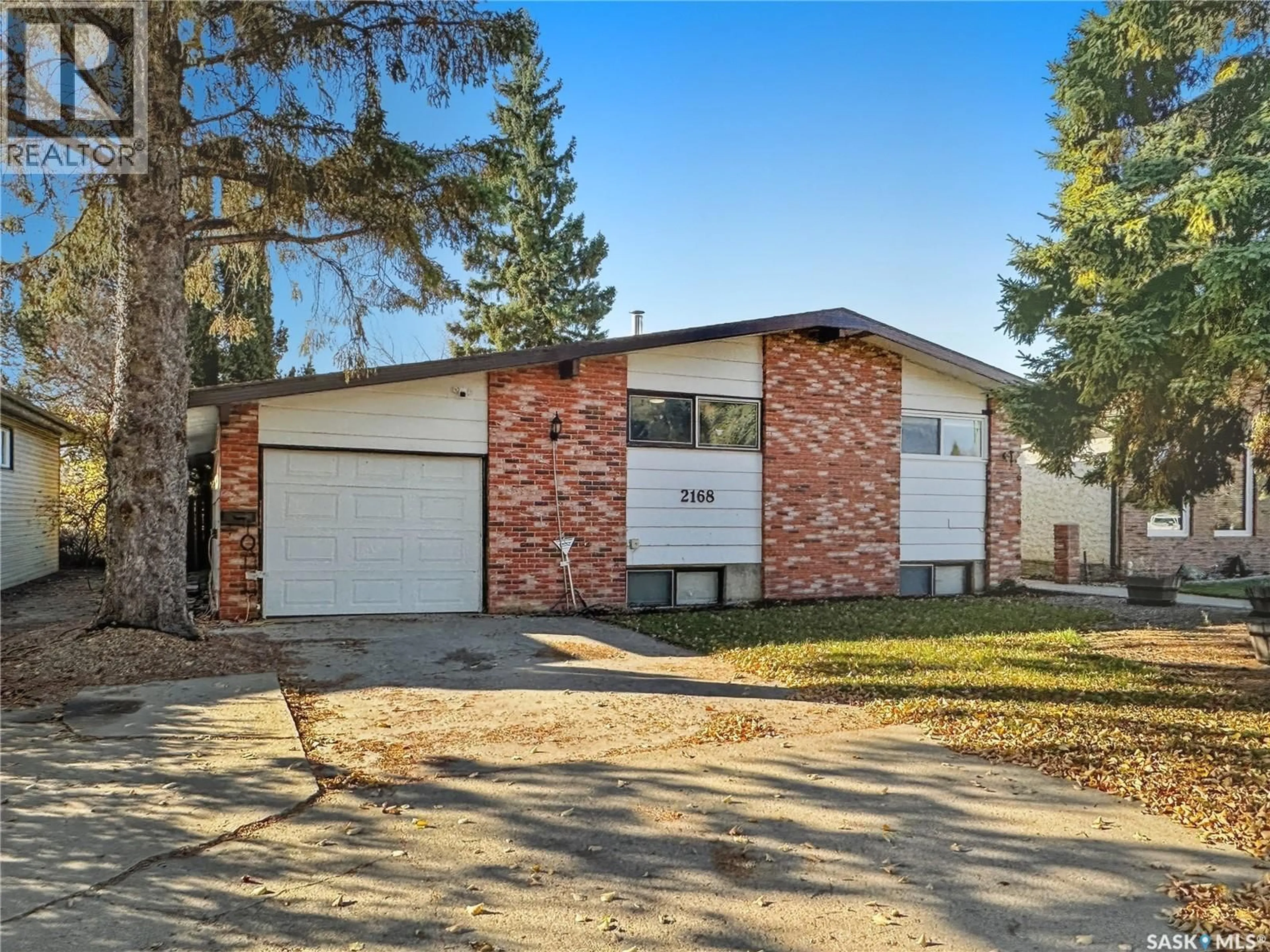 Home with brick exterior material, street for 2168 DOUGLAS AVENUE, North Battleford Saskatchewan S9A3A9