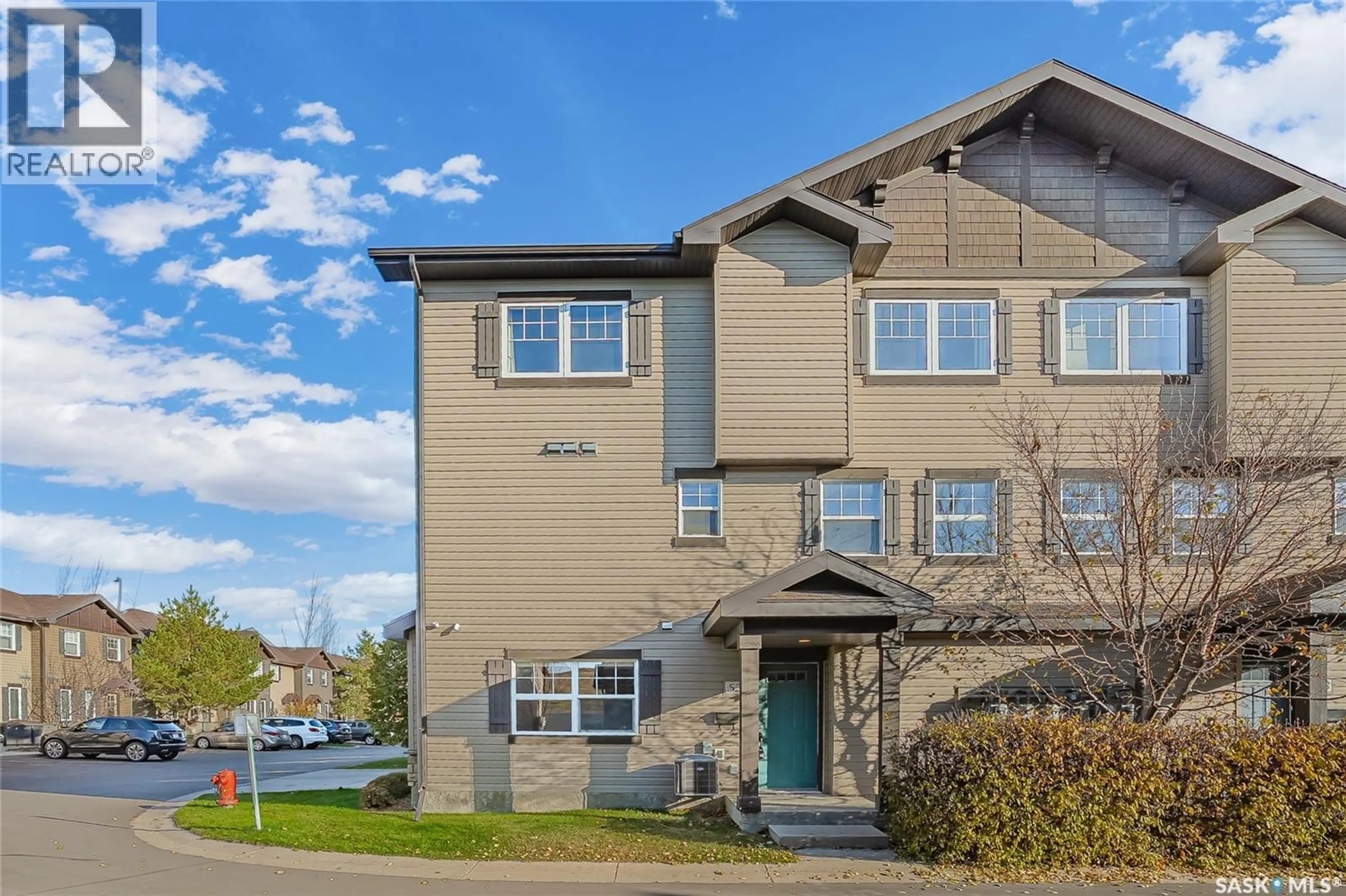 Home with vinyl exterior material, street for 522 150 LANGLOIS WAY, Saskatoon Saskatchewan S7T0K8