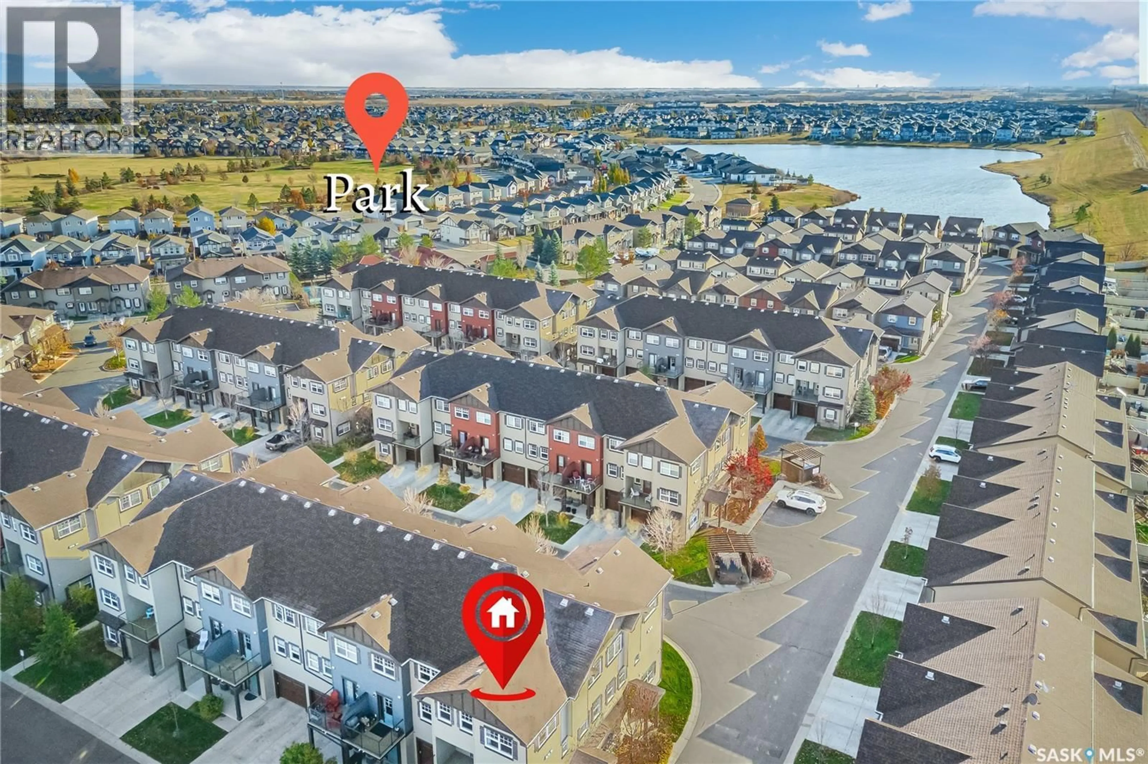 A pic from outside/outdoor area/front of a property/back of a property/a pic from drone, water/lake/river/ocean view for 522 150 LANGLOIS WAY, Saskatoon Saskatchewan S7T0K8
