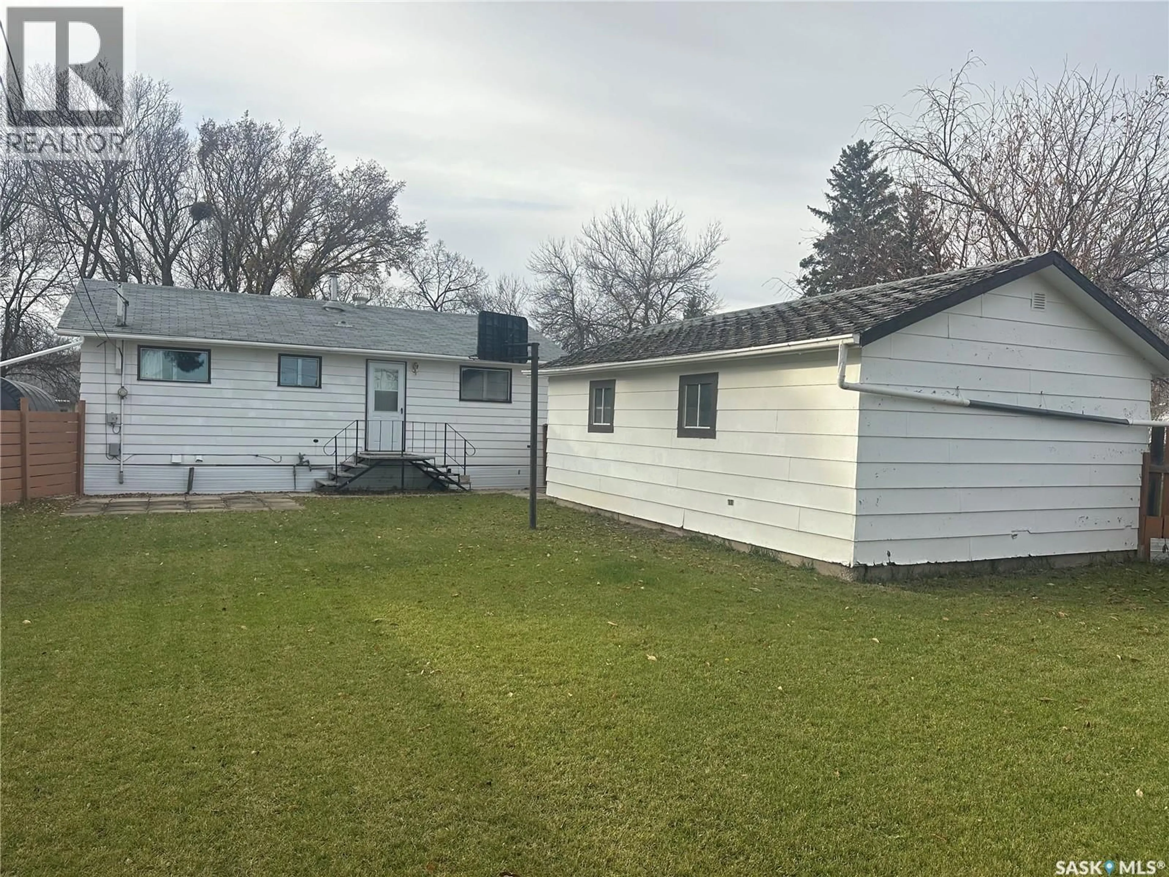 A pic from outside/outdoor area/front of a property/back of a property/a pic from drone, street for 220 AVENUE ROAD, Kamsack Saskatchewan S0A1S0