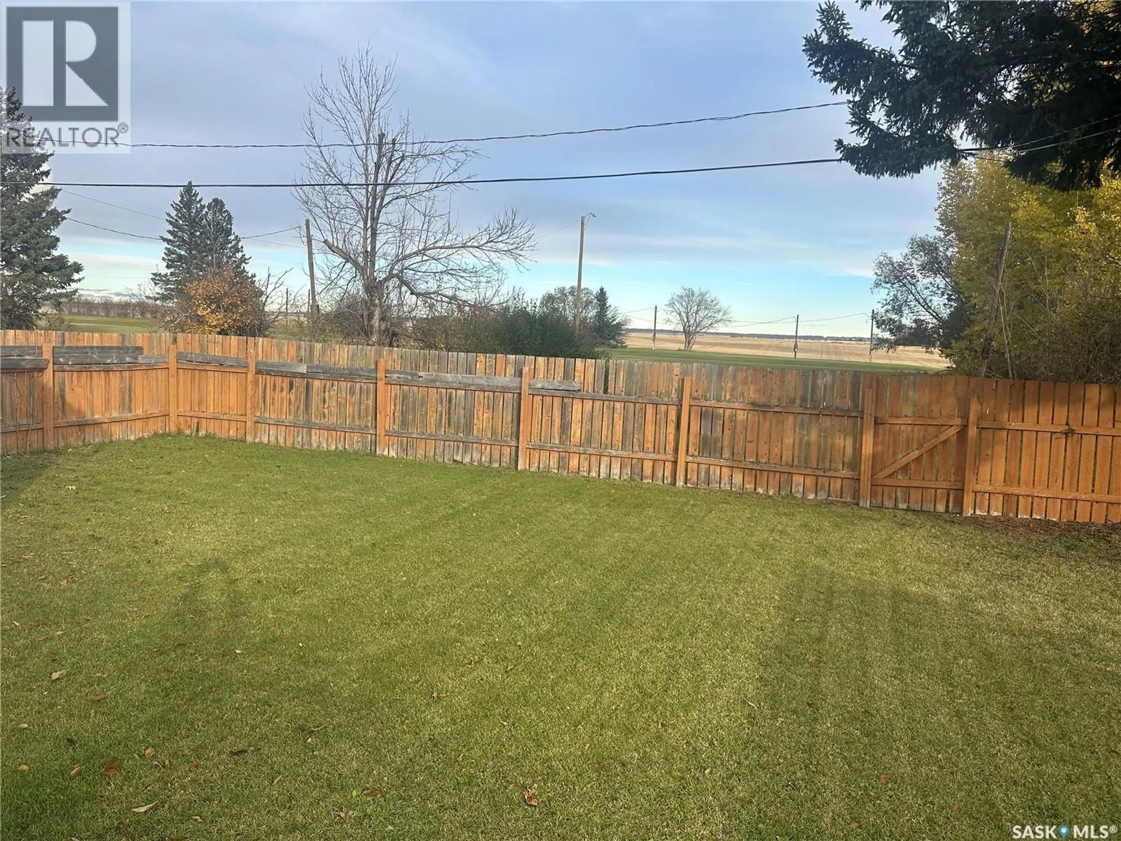 A pic from outside/outdoor area/front of a property/back of a property/a pic from drone, unknown for 220 AVENUE ROAD, Kamsack Saskatchewan S0A1S0