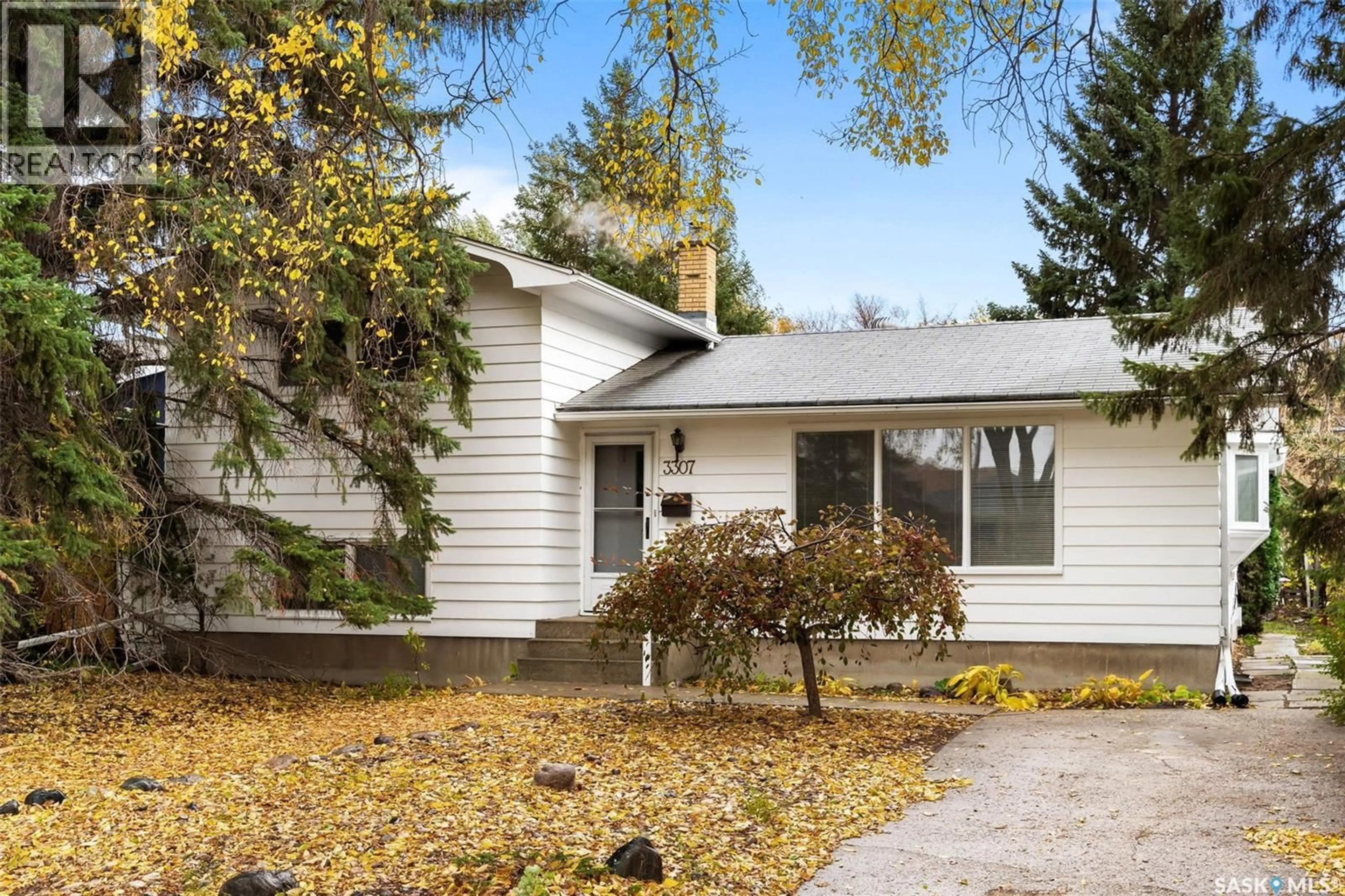 Home with vinyl exterior material, street for 3307 28TH AVENUE, Regina Saskatchewan S4S2N1