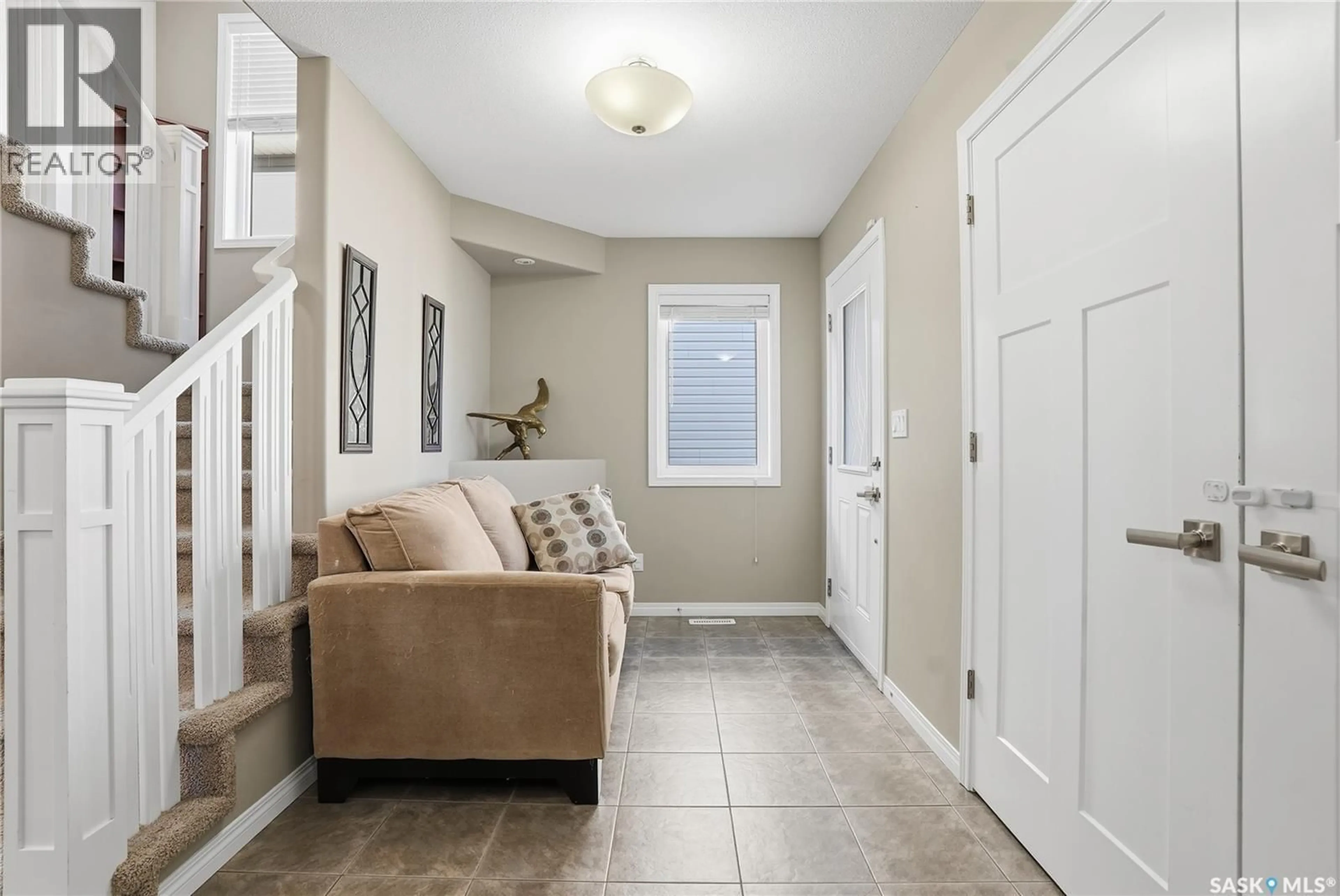 Indoor entryway for 115 CHILDERS CRESCENT, Saskatoon Saskatchewan S7L3G4