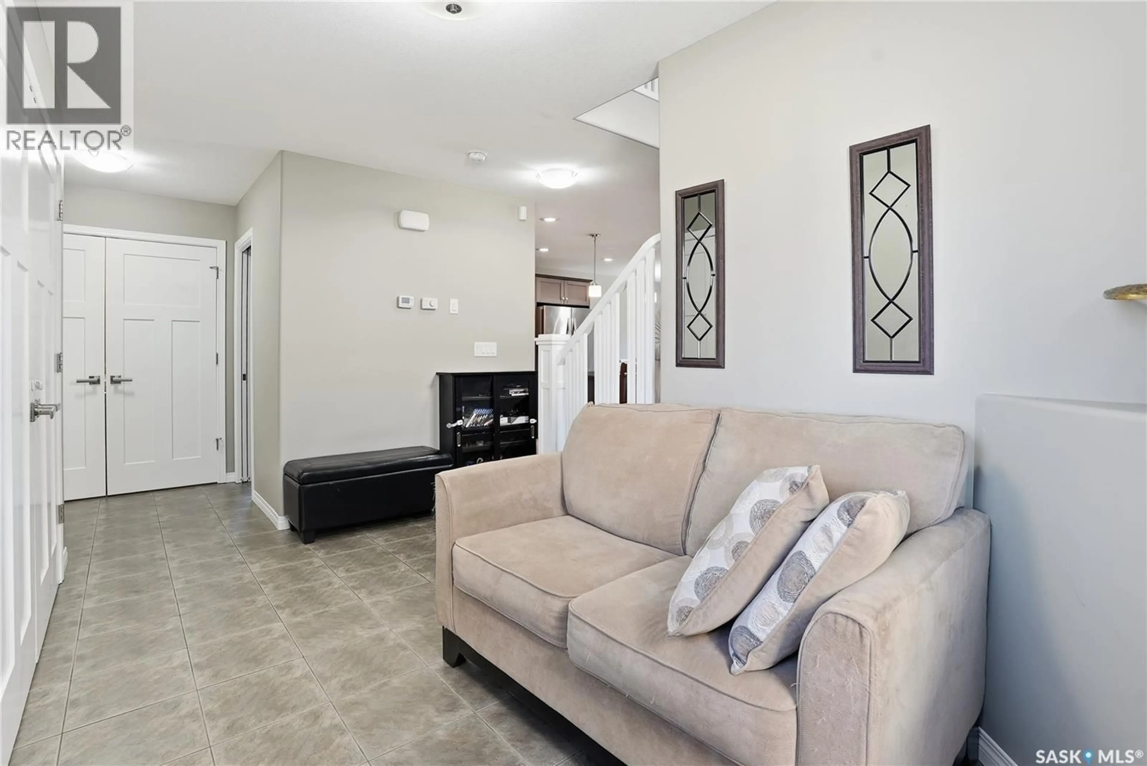 Living room with furniture, unknown for 115 CHILDERS CRESCENT, Saskatoon Saskatchewan S7L3G4
