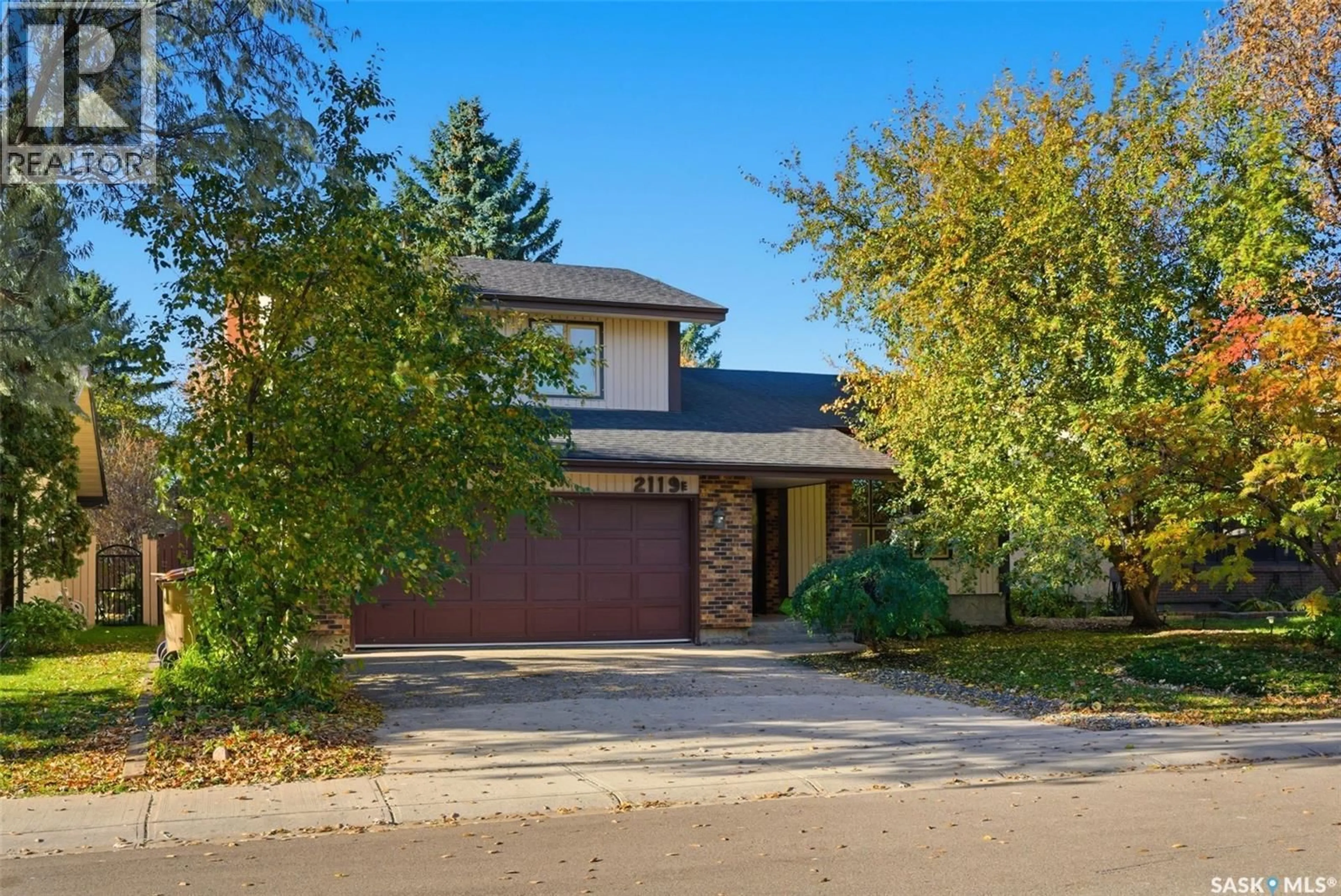 Home with brick exterior material, street for 2119 ELDERKIN DRIVE, Regina Saskatchewan S4V0L8