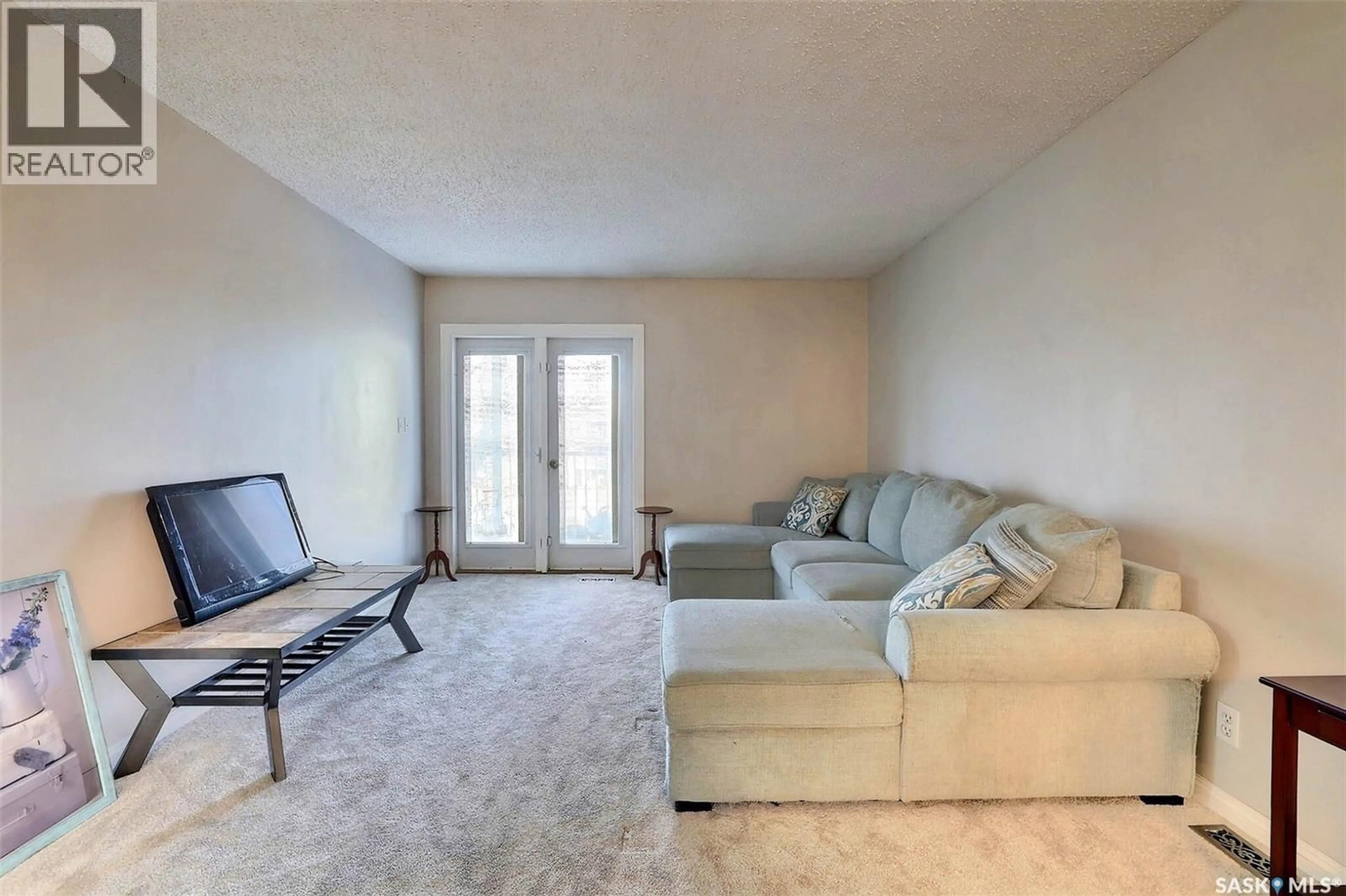 Living room with furniture, unknown for 6595 - 16 ROCHDALE BOULEVARD, Regina Saskatchewan S4X2Z1