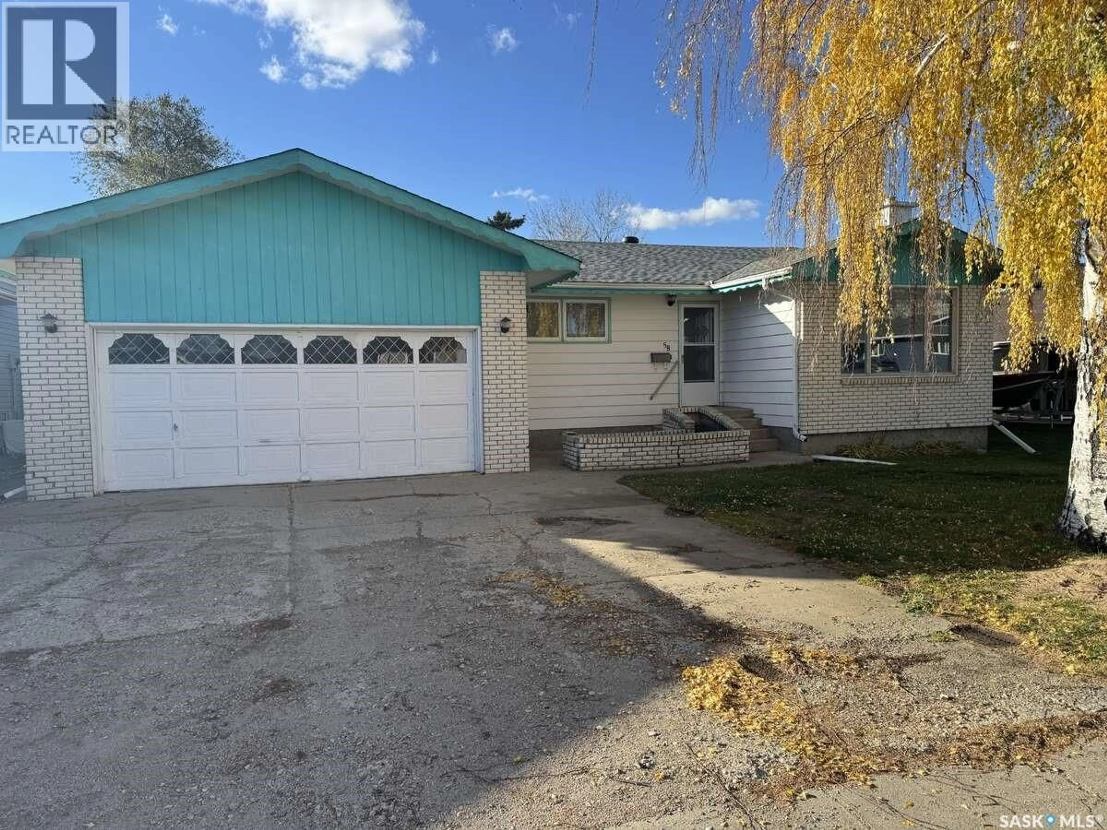 Home with vinyl exterior material, street for 58 STEWART CRESCENT, Yorkton Saskatchewan S3N3J5