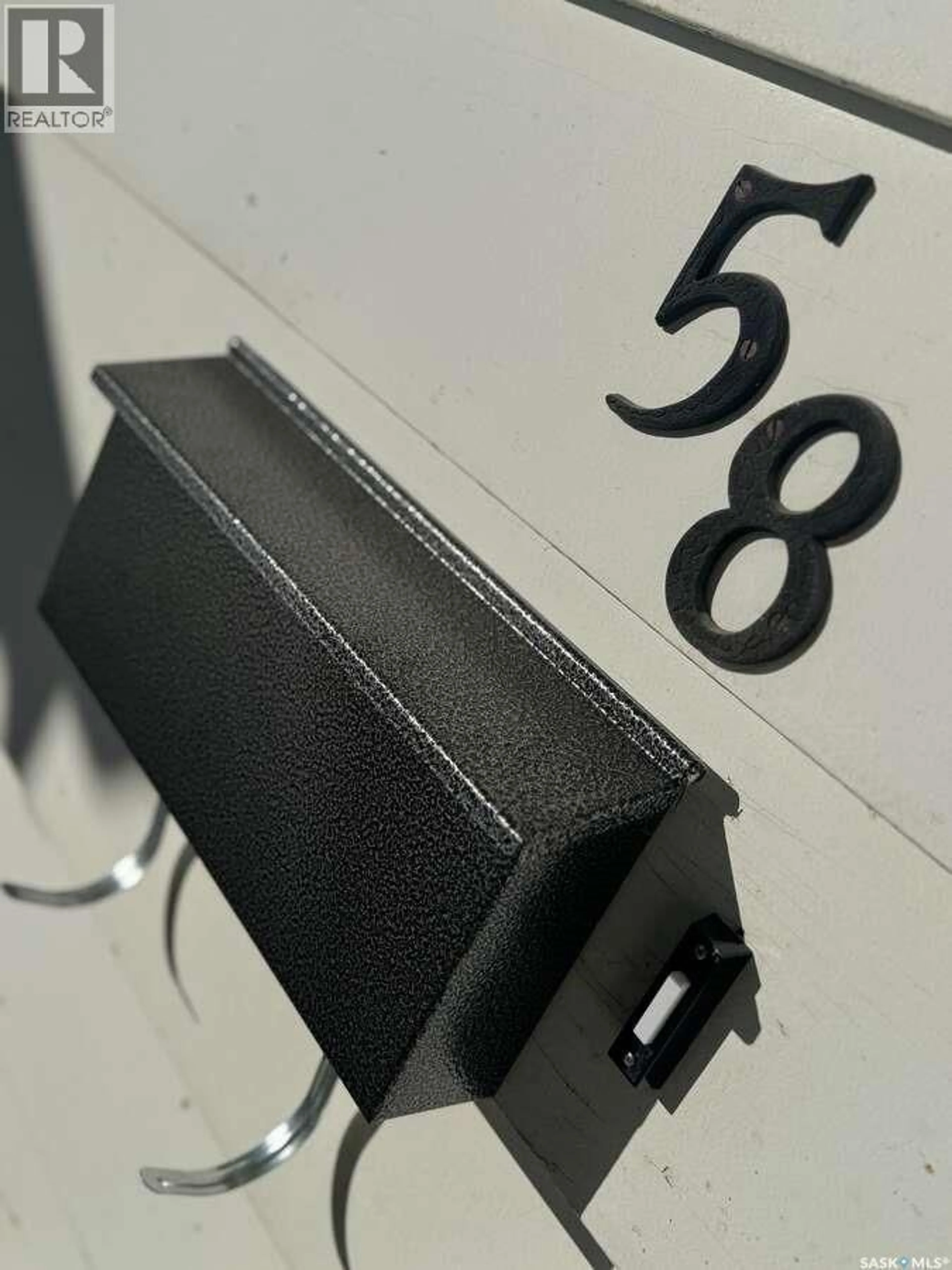 Home with vinyl exterior material, street for 58 STEWART CRESCENT, Yorkton Saskatchewan S3N3J5