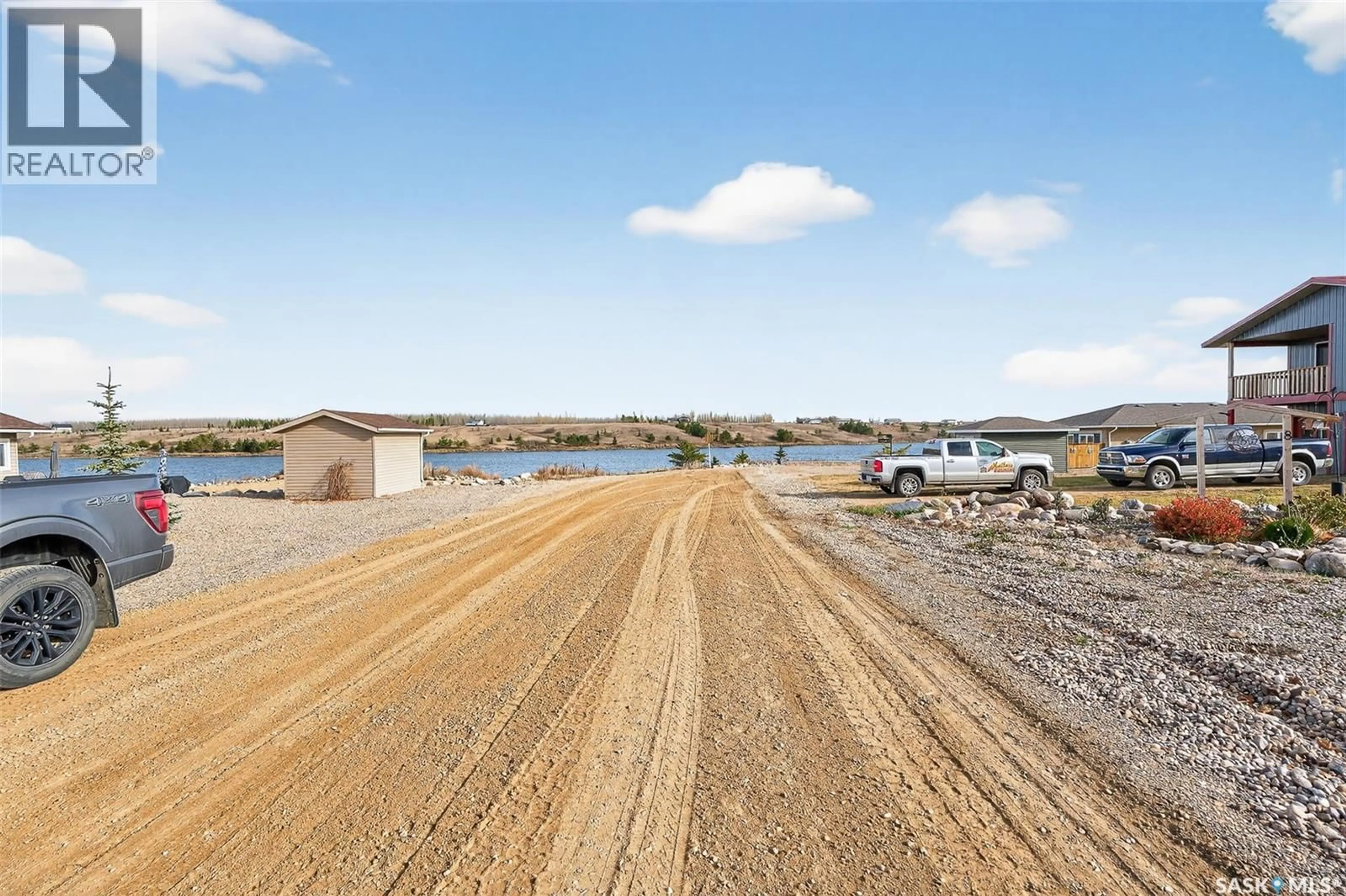 A pic from outside/outdoor area/front of a property/back of a property/a pic from drone, water/lake/river/ocean view for 8 SUNRISE BOULEVARD, Craik Rm No. 222 Saskatchewan S0G0V0