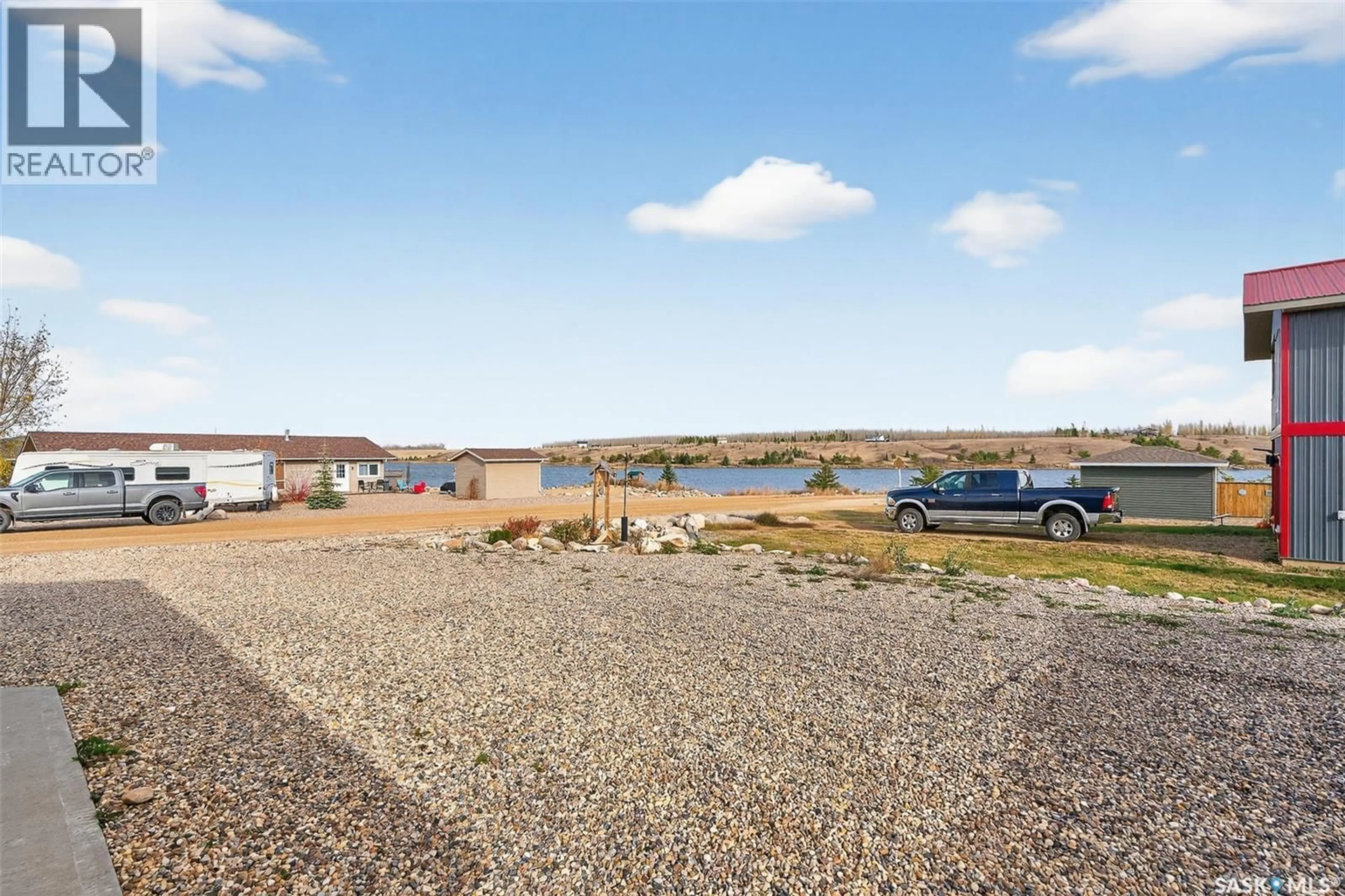 A pic from outside/outdoor area/front of a property/back of a property/a pic from drone, water/lake/river/ocean view for 8 SUNRISE BOULEVARD, Craik Rm No. 222 Saskatchewan S0G0V0