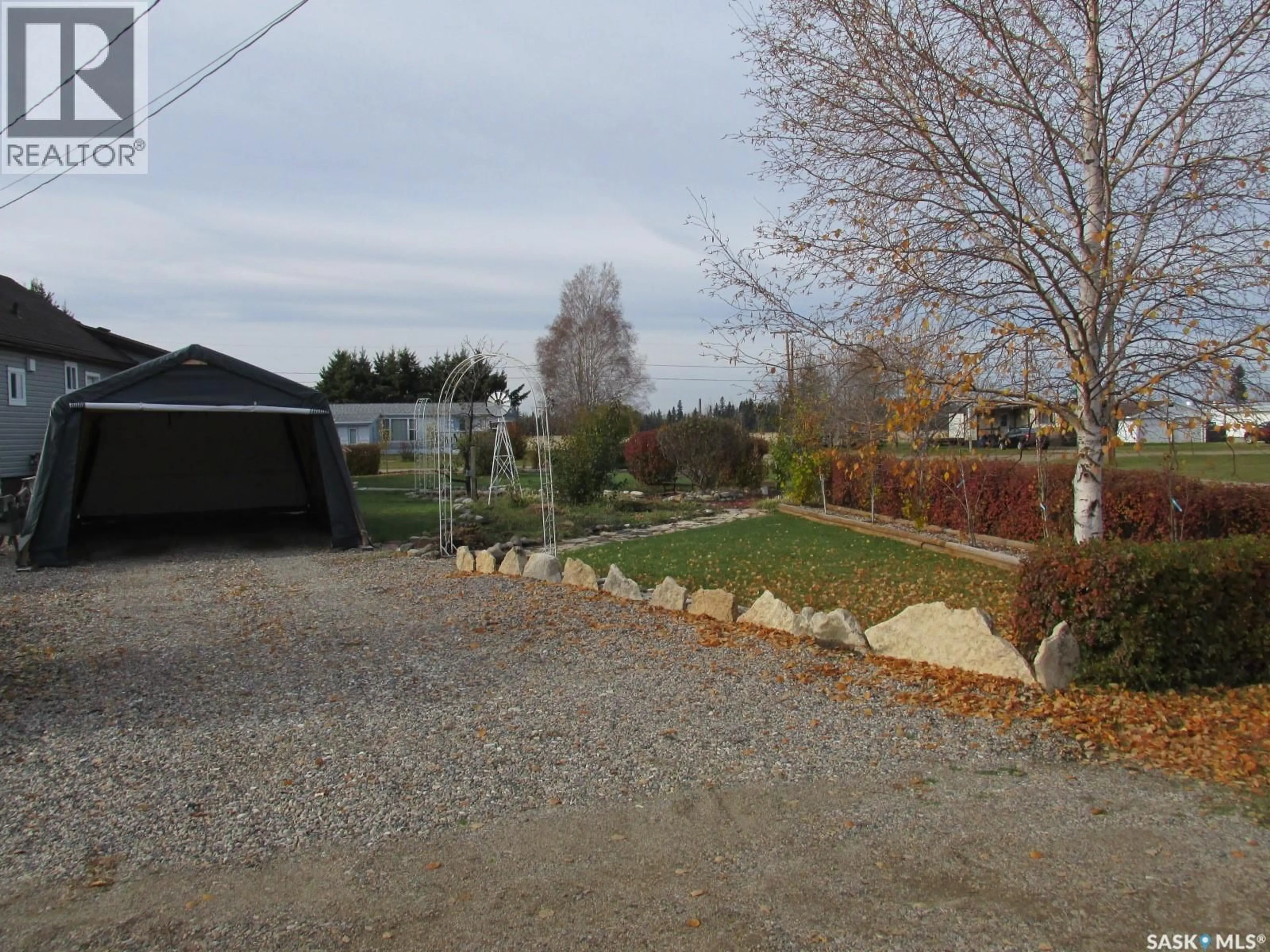 A pic from outside/outdoor area/front of a property/back of a property/a pic from drone, street for 302 RUSTAD AVENUE, White Fox Saskatchewan S0J3B0
