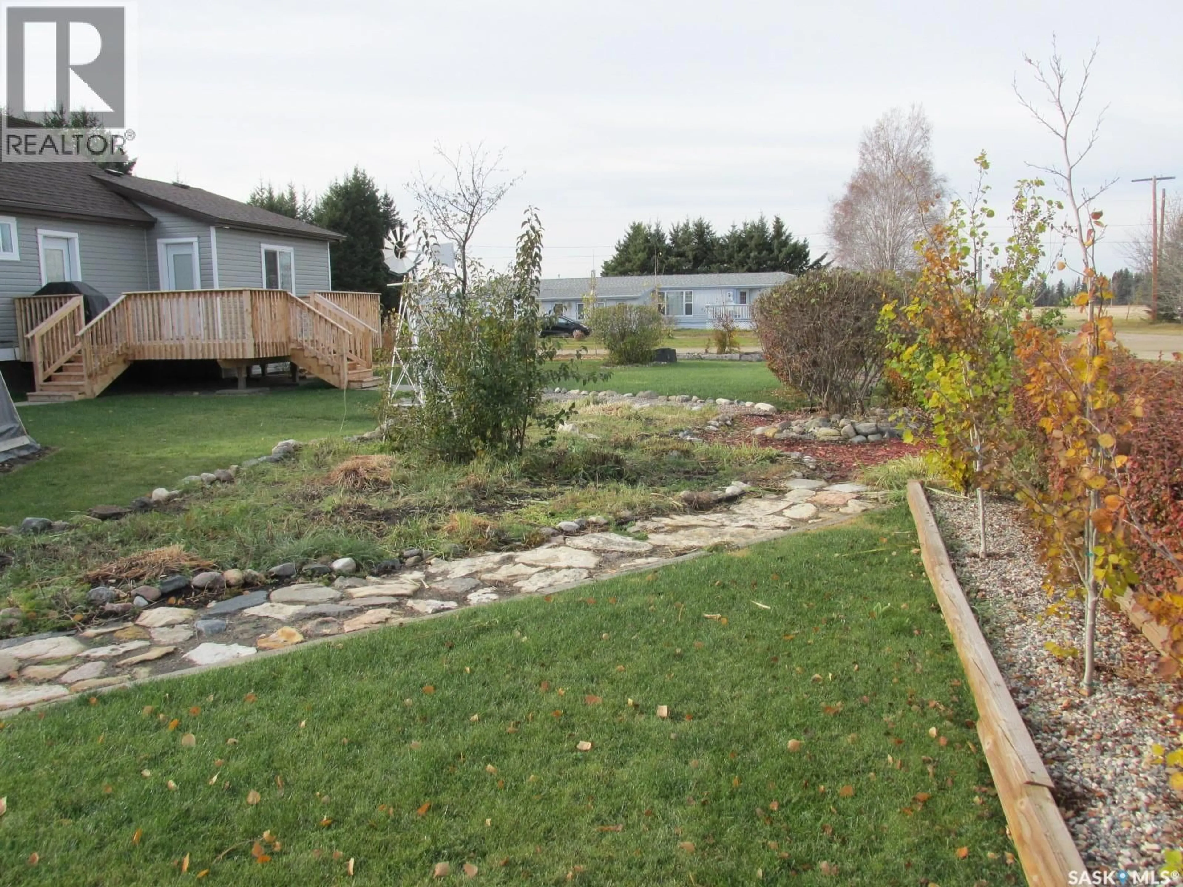 A pic from outside/outdoor area/front of a property/back of a property/a pic from drone, water/lake/river/ocean view for 302 RUSTAD AVENUE, White Fox Saskatchewan S0J3B0