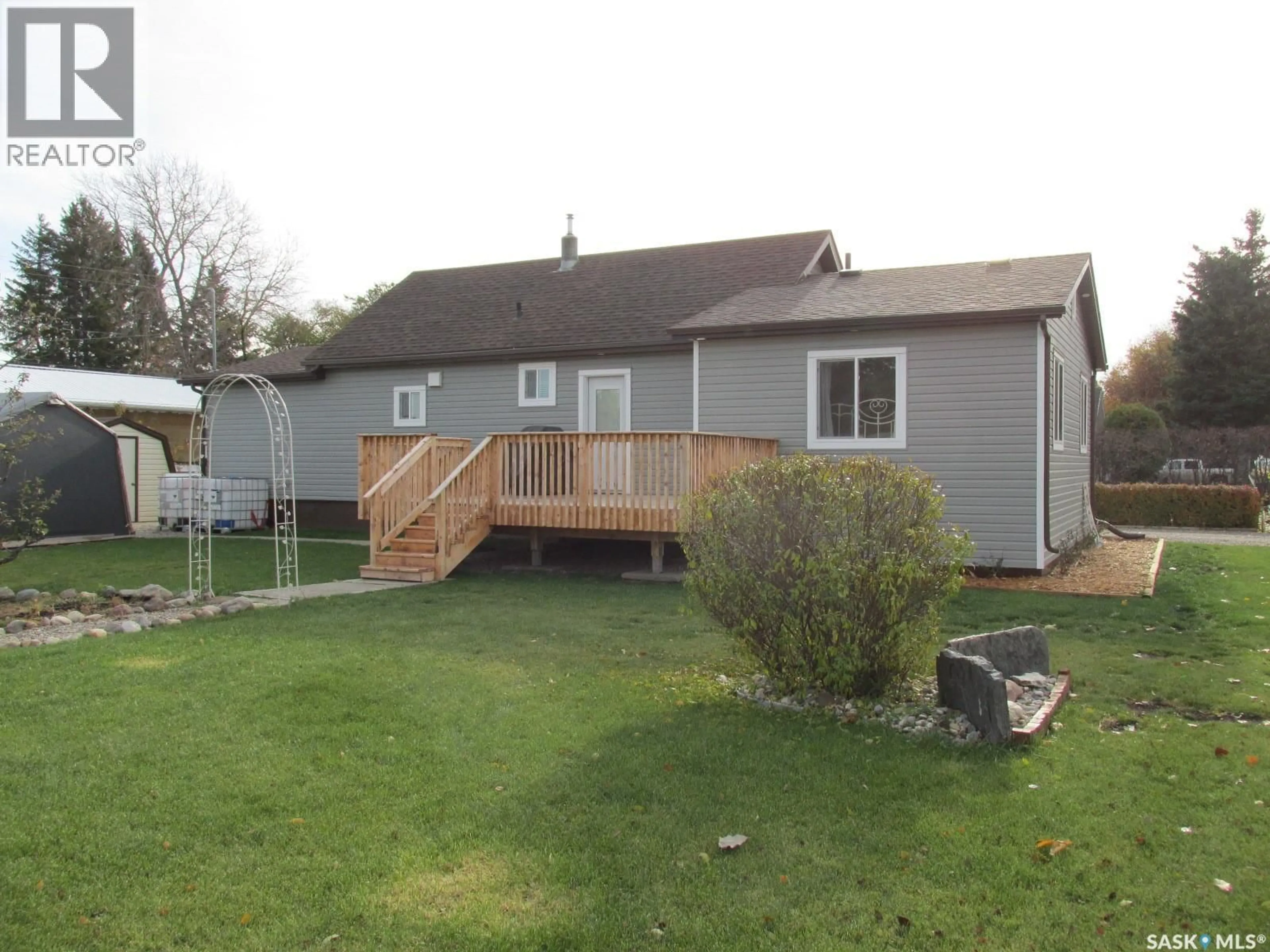 Home with vinyl exterior material, street for 302 RUSTAD AVENUE, White Fox Saskatchewan S0J3B0