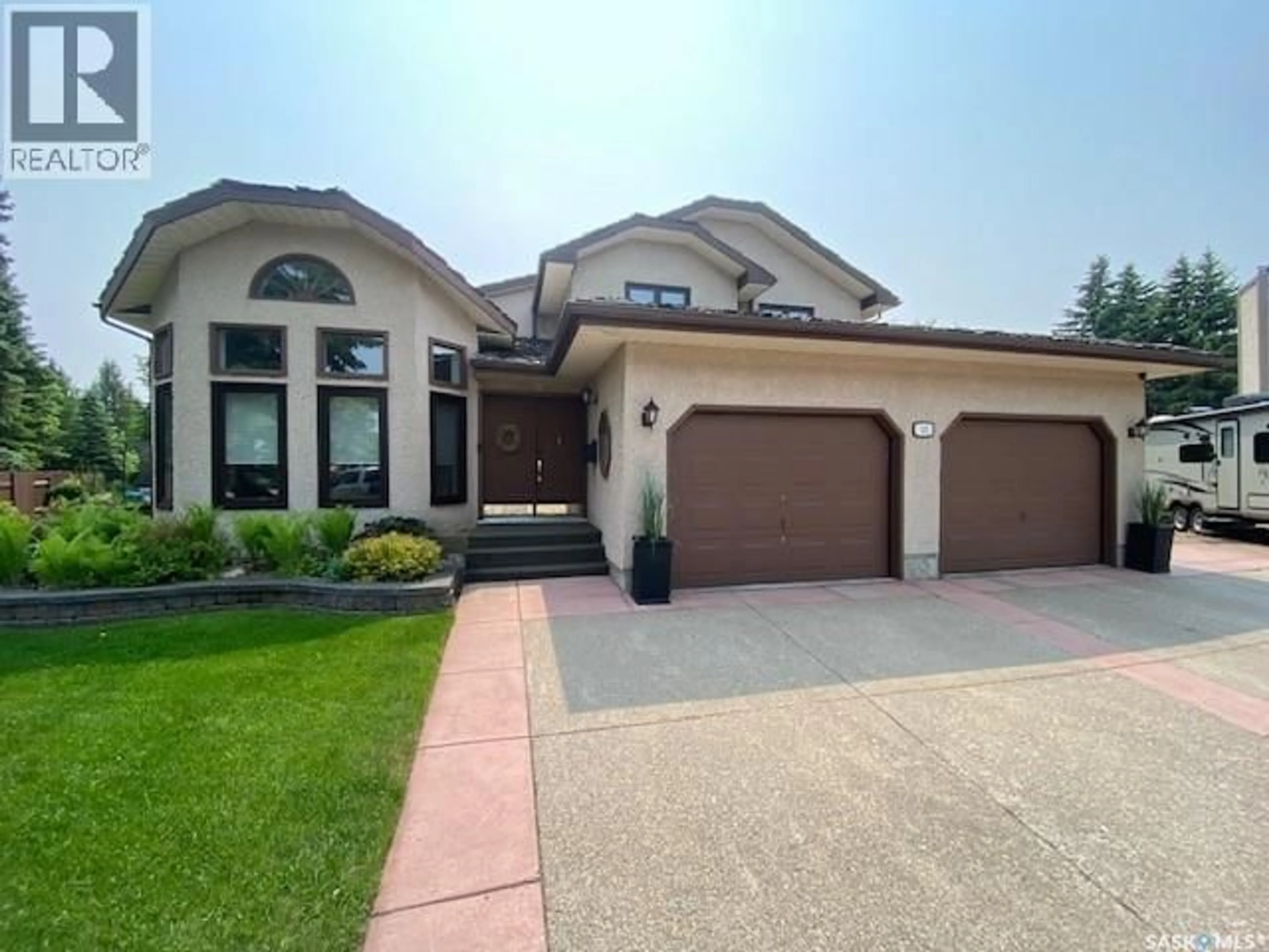 Home with brick exterior material, street for 32 WINDFIELD PLACE, Yorkton Saskatchewan S3N3P8