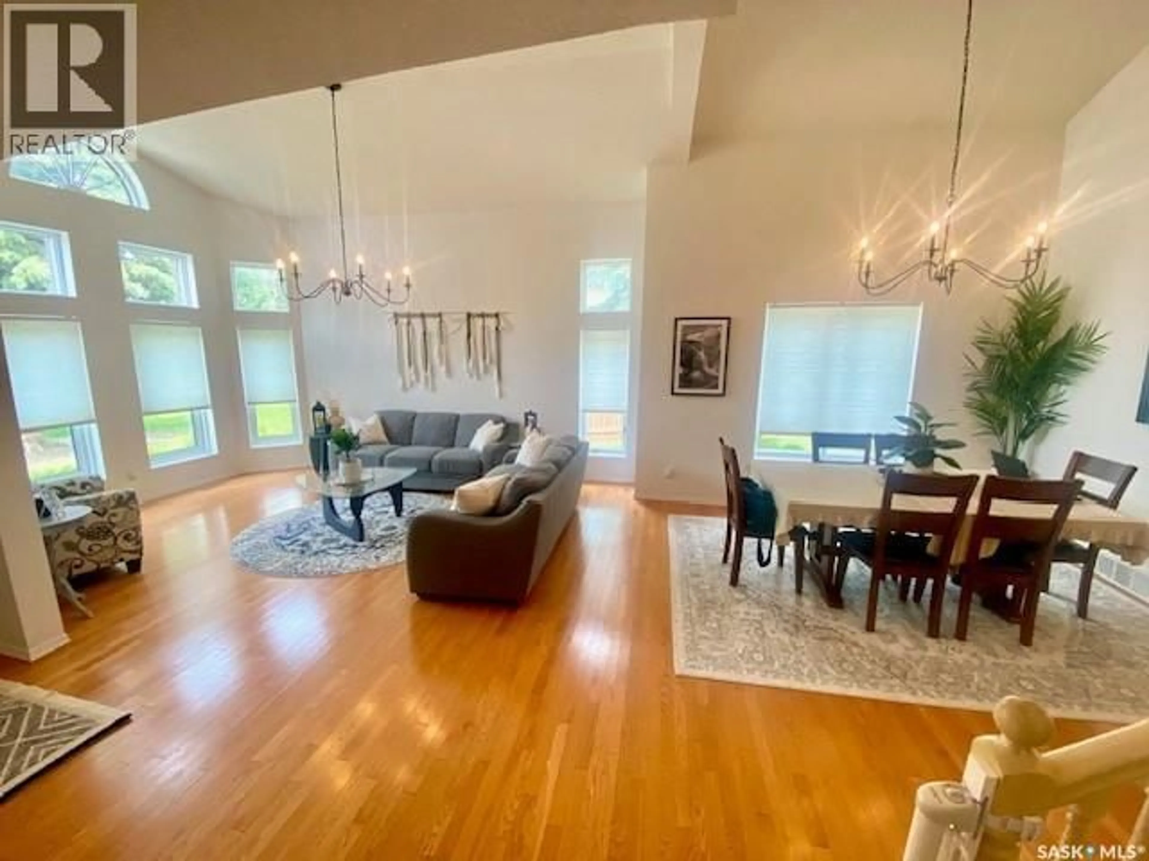 Living room with furniture, wood/laminate floor for 32 WINDFIELD PLACE, Yorkton Saskatchewan S3N3P8