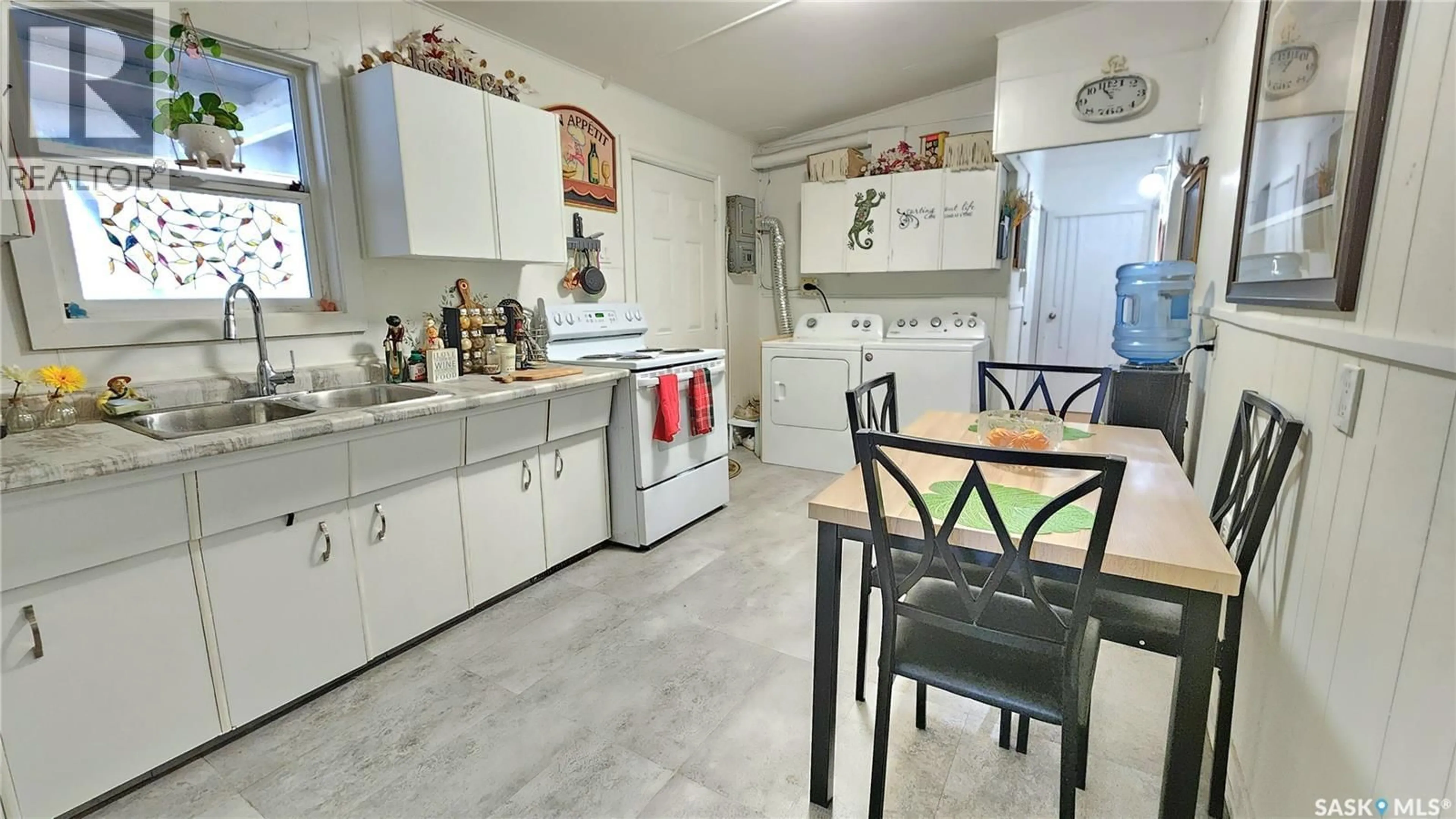 Standard kitchen, ceramic/tile floor for 1401 - 43 114TH STREET, North Battleford Saskatchewan S9A3G4