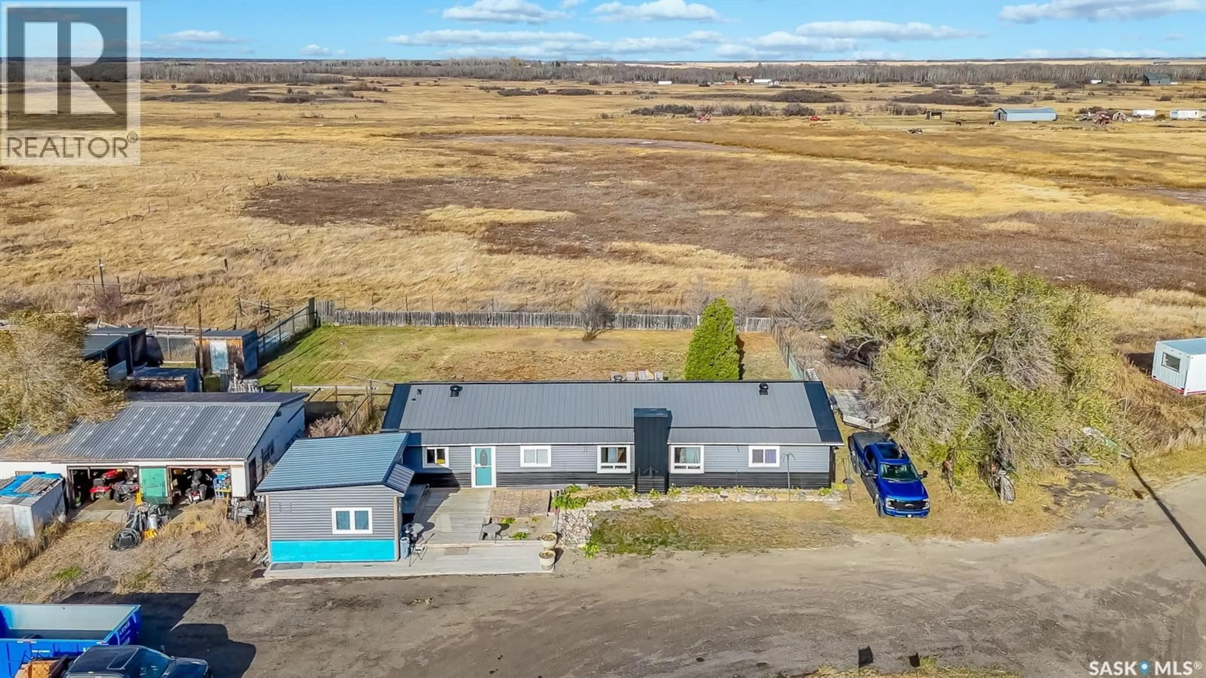 A pic from outside/outdoor area/front of a property/back of a property/a pic from drone, building for HORSEMAN ACREAGE, Vanscoy Rm No. 345 Saskatchewan S0L3J0
