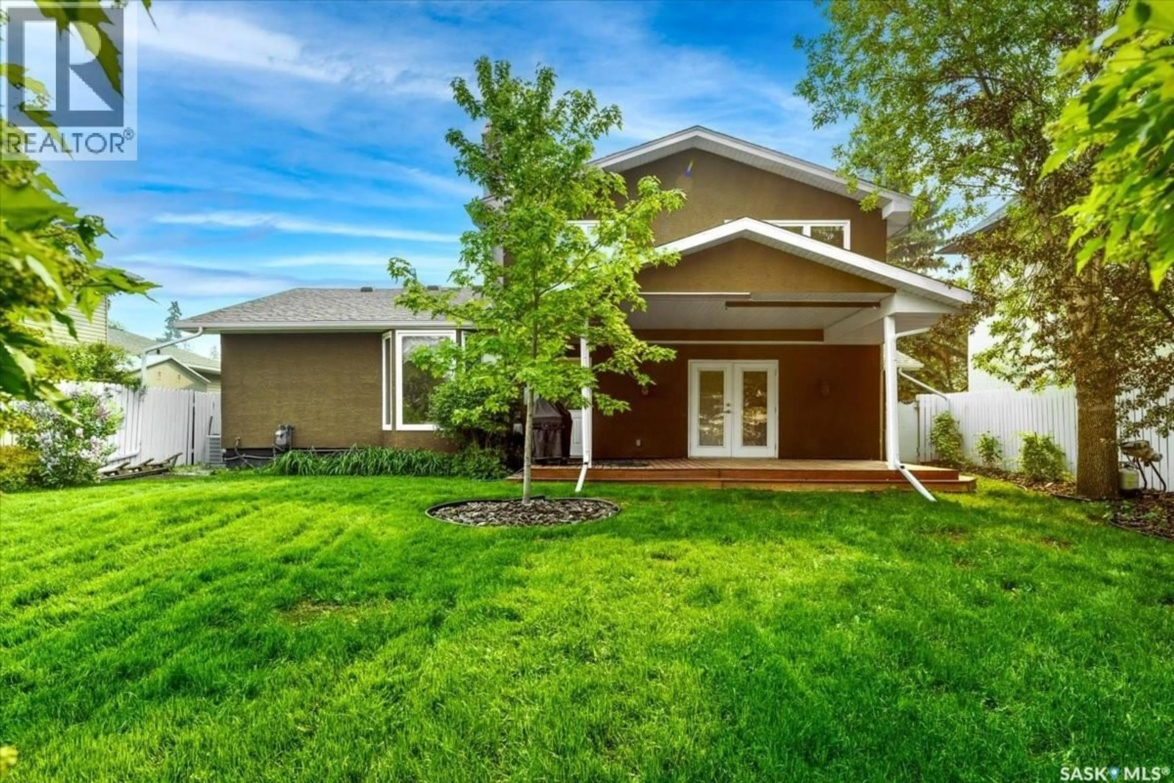 Home with vinyl exterior material, street for 50 LOWRY PLACE, Regina Saskatchewan S4S6C7