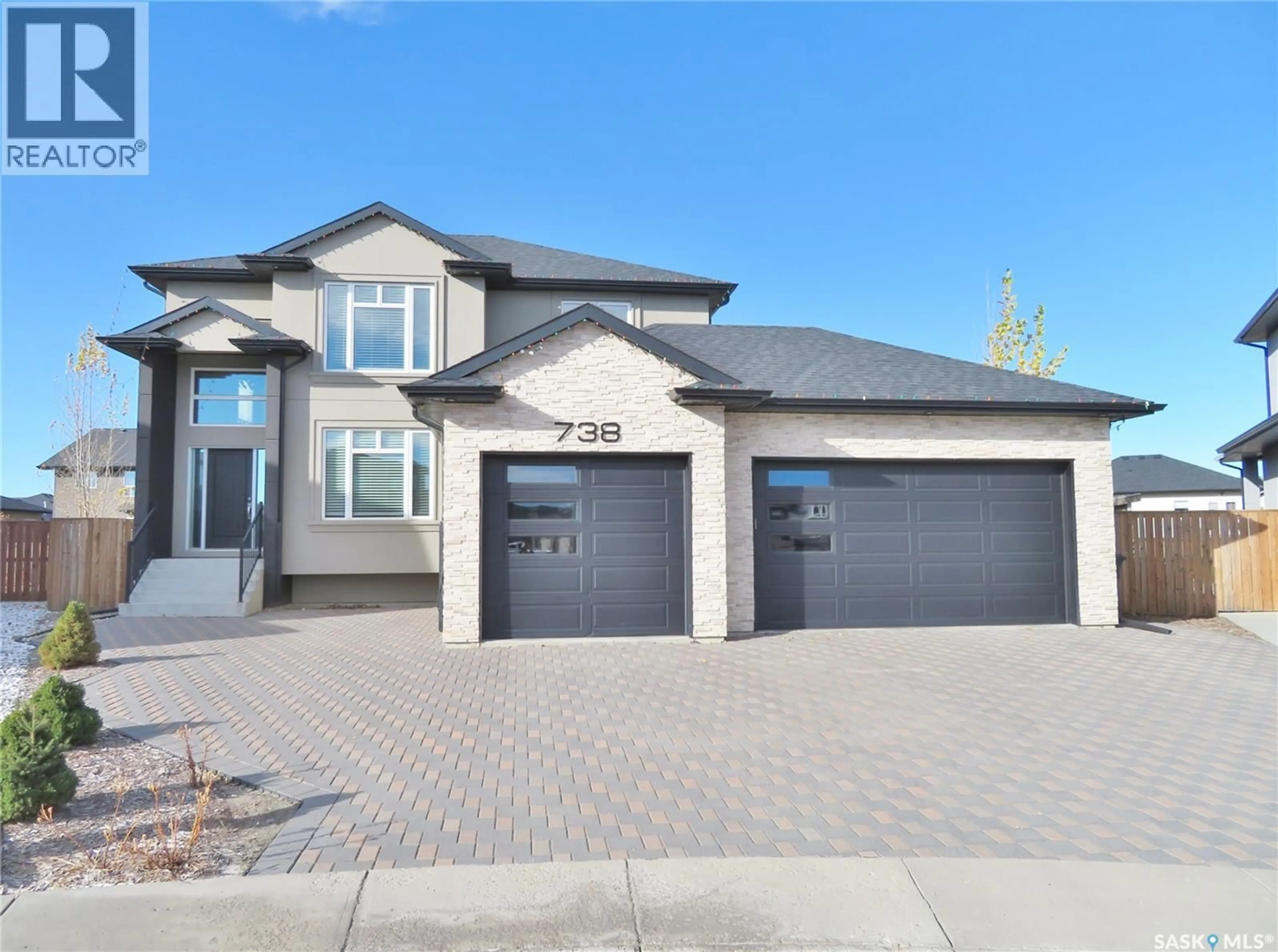 Home with brick exterior material, street for 738 PICHLER COVE, Saskatoon Saskatchewan S7V0G2