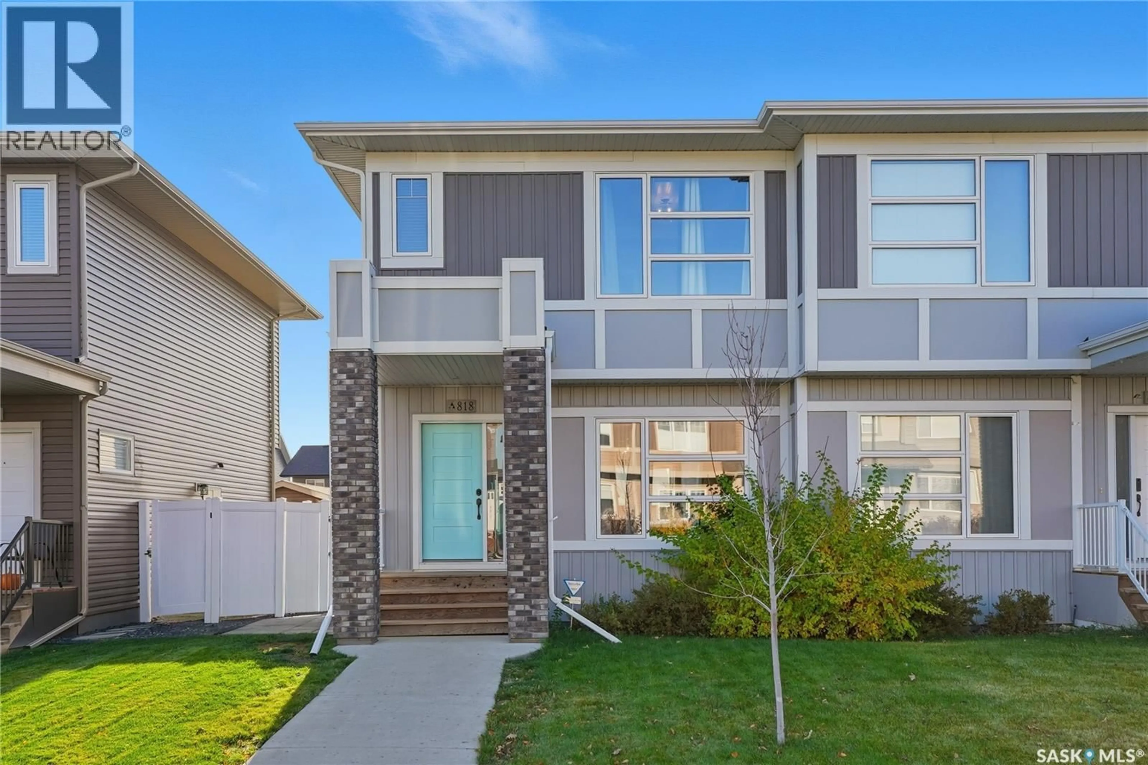 Home with vinyl exterior material, street for 818 MCFAULL RISE, Saskatoon Saskatchewan S7V0S6