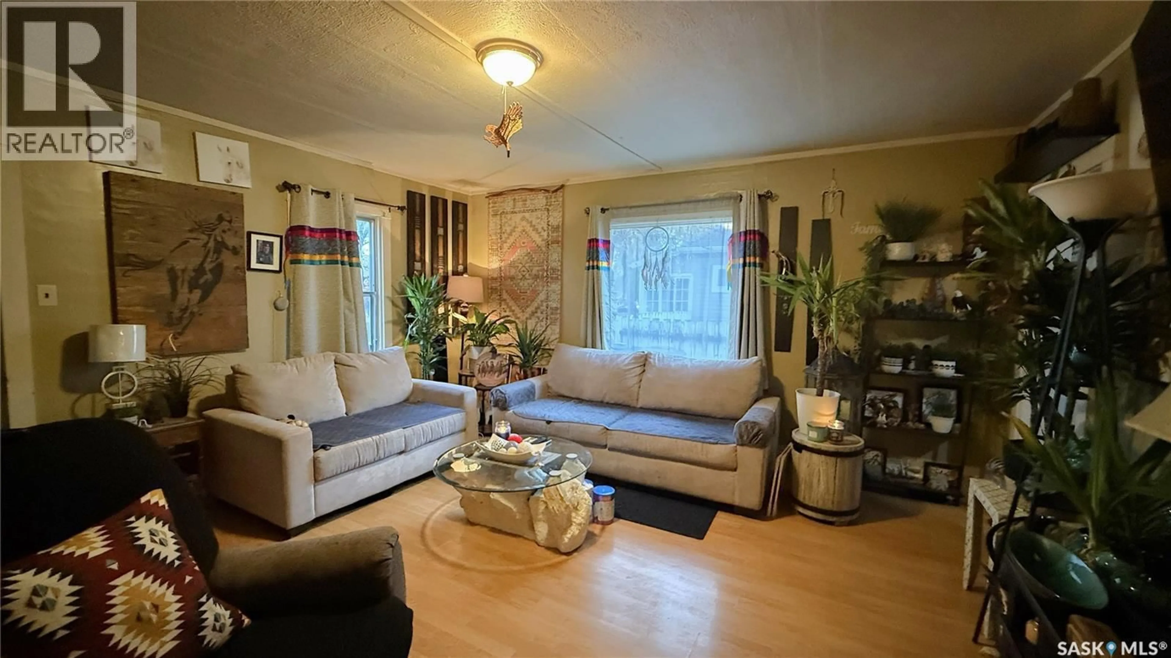 Living room with furniture, unknown for 1481 104TH STREET, North Battleford Saskatchewan S9A1P2