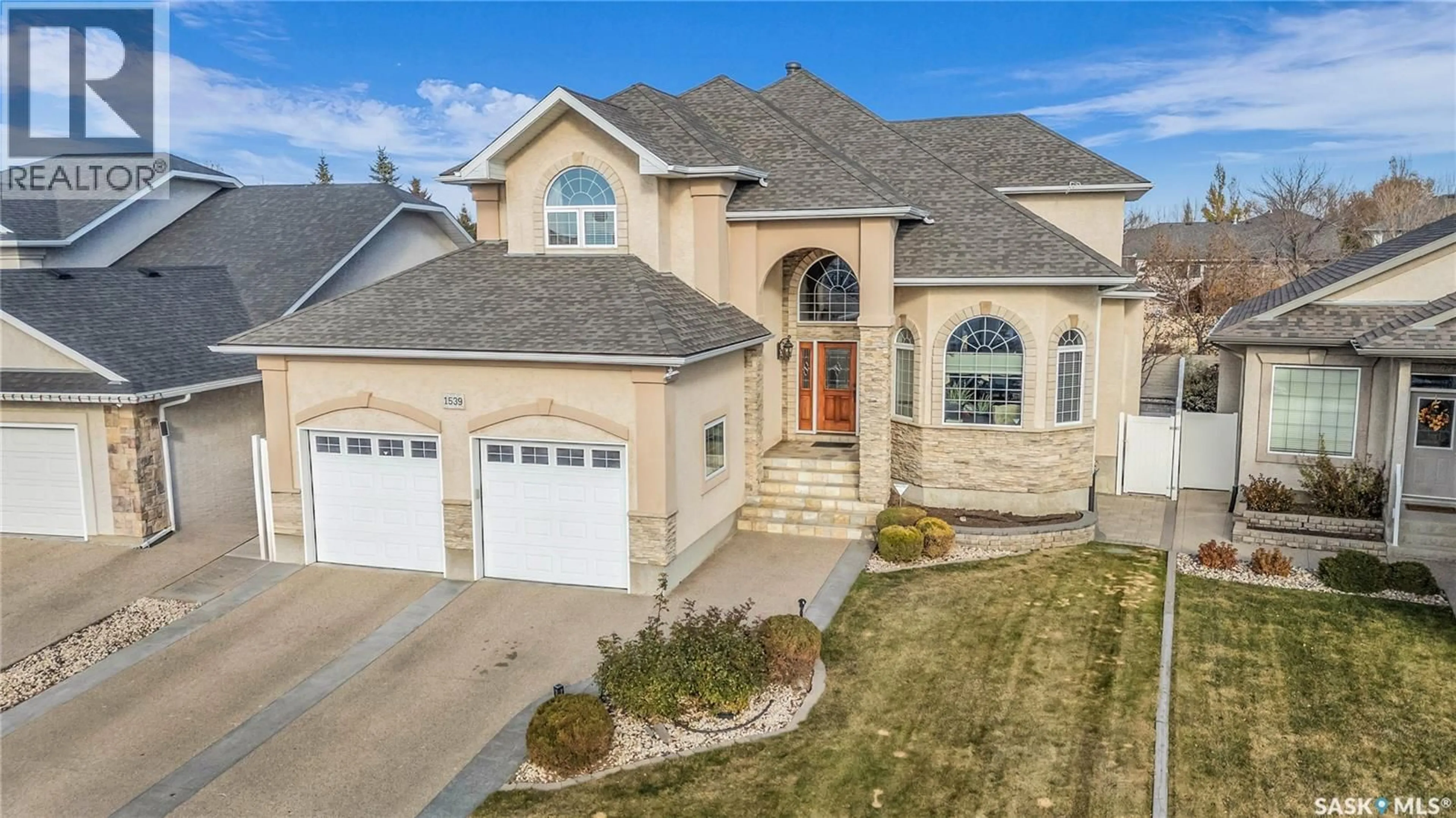 Home with brick exterior material, street for 1539 LAKERIDGE DRIVE, Regina Saskatchewan S4X4L5