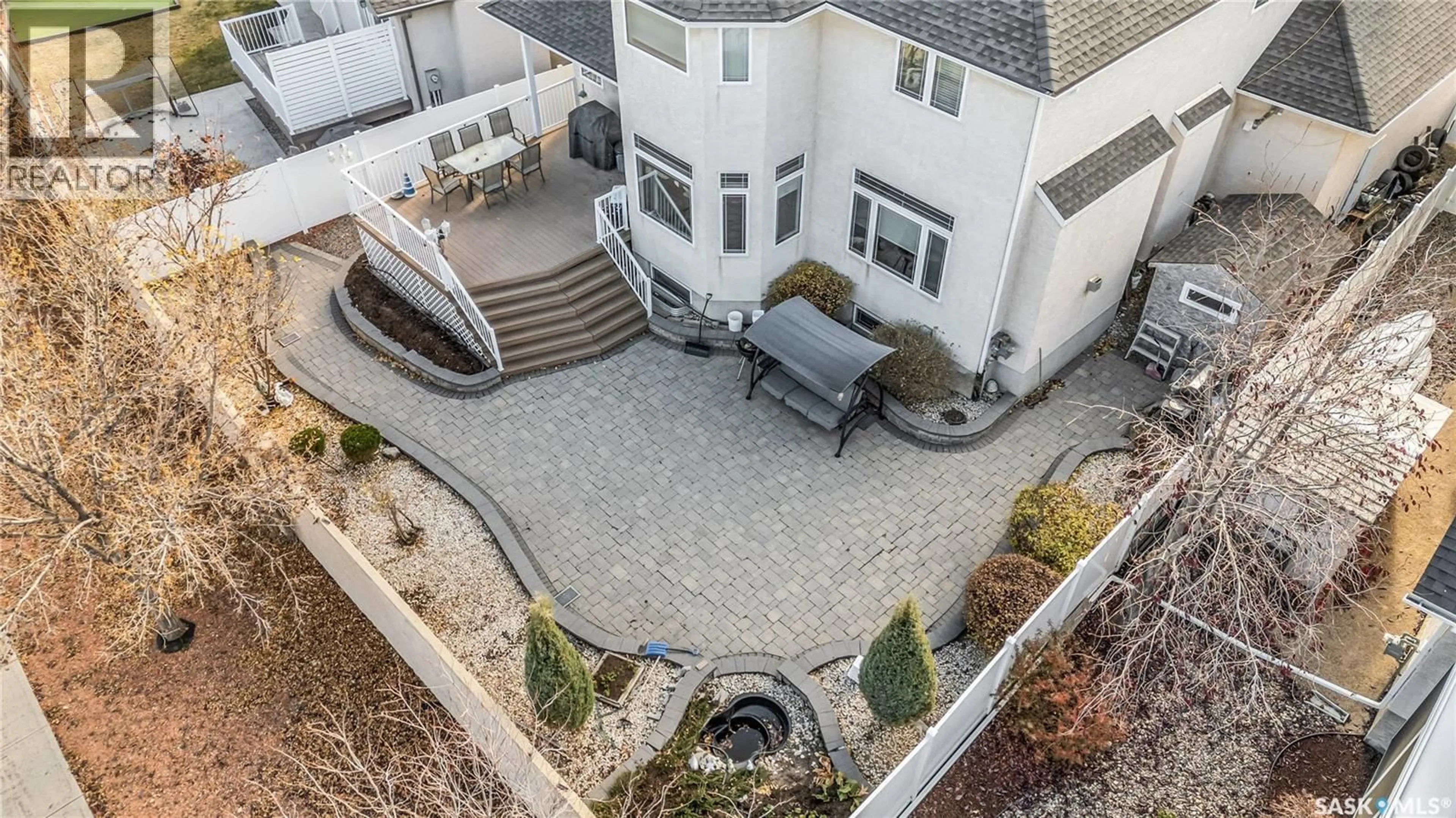 A pic from outside/outdoor area/front of a property/back of a property/a pic from drone, street for 1539 LAKERIDGE DRIVE, Regina Saskatchewan S4X4L5