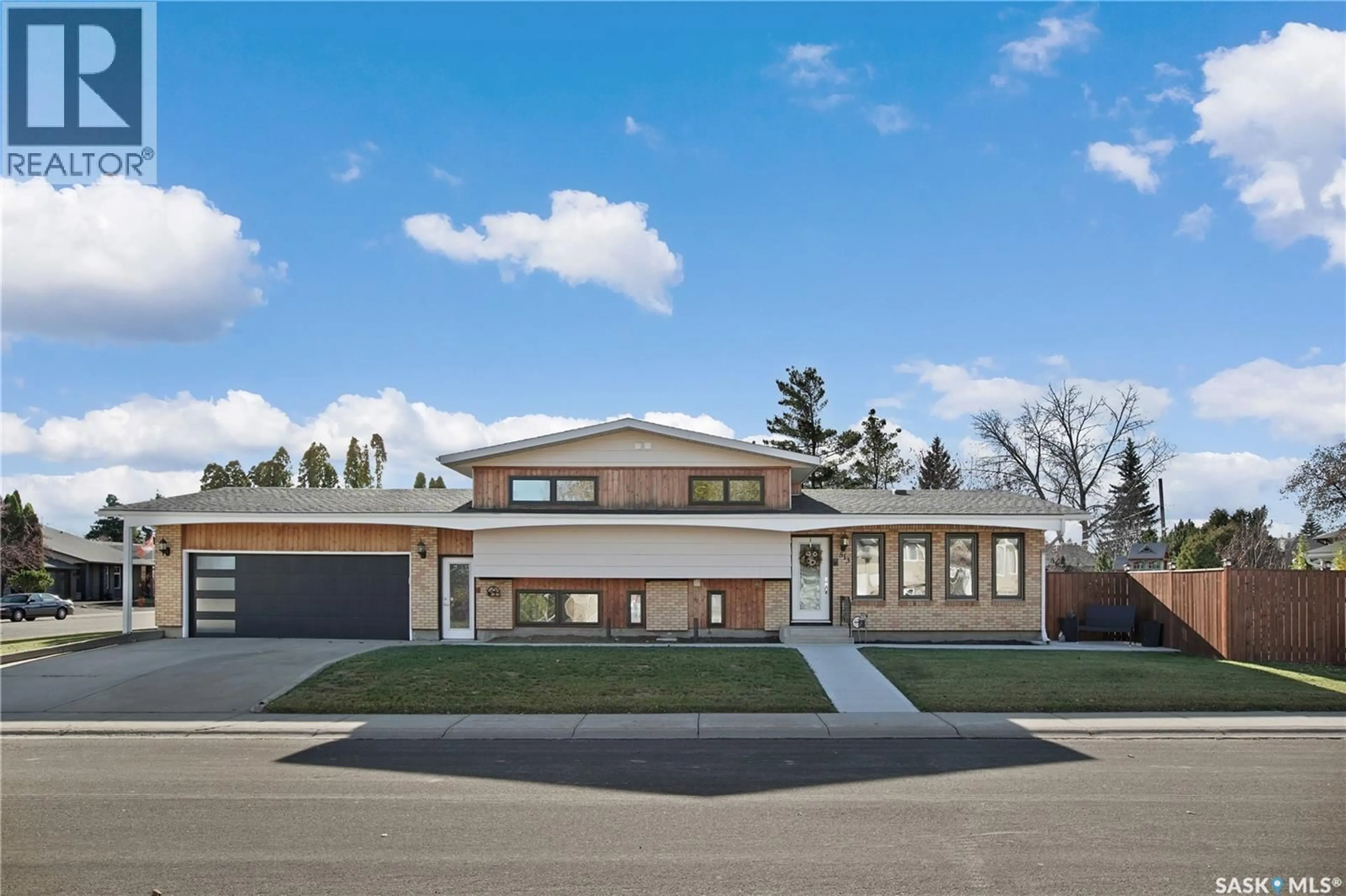 Home with brick exterior material, street for 513 6TH AVENUE, Warman Saskatchewan S0K1X1