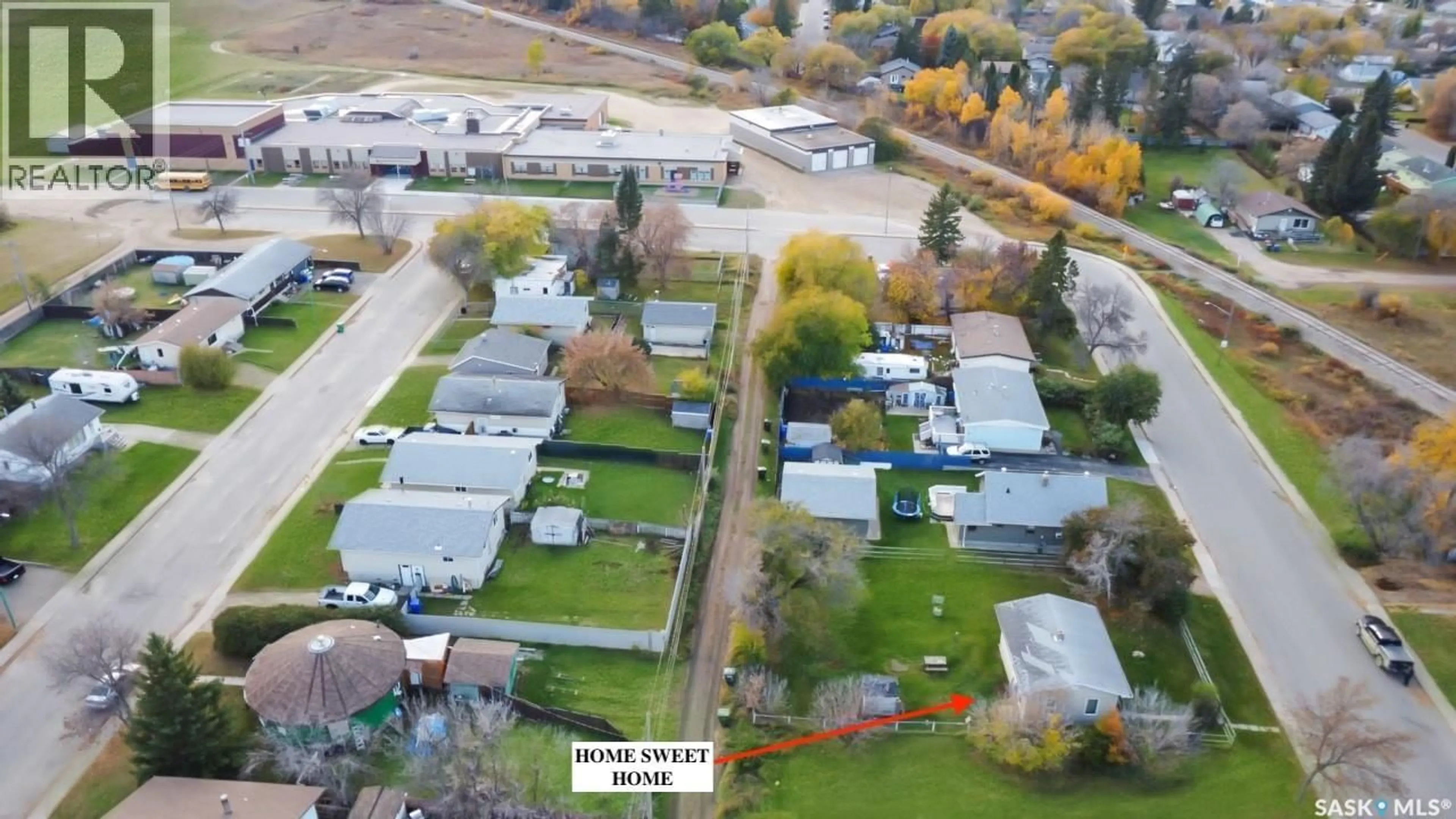 A pic from outside/outdoor area/front of a property/back of a property/a pic from drone, street for 1319 17TH STREET, Prince Albert Saskatchewan S6V3Z3