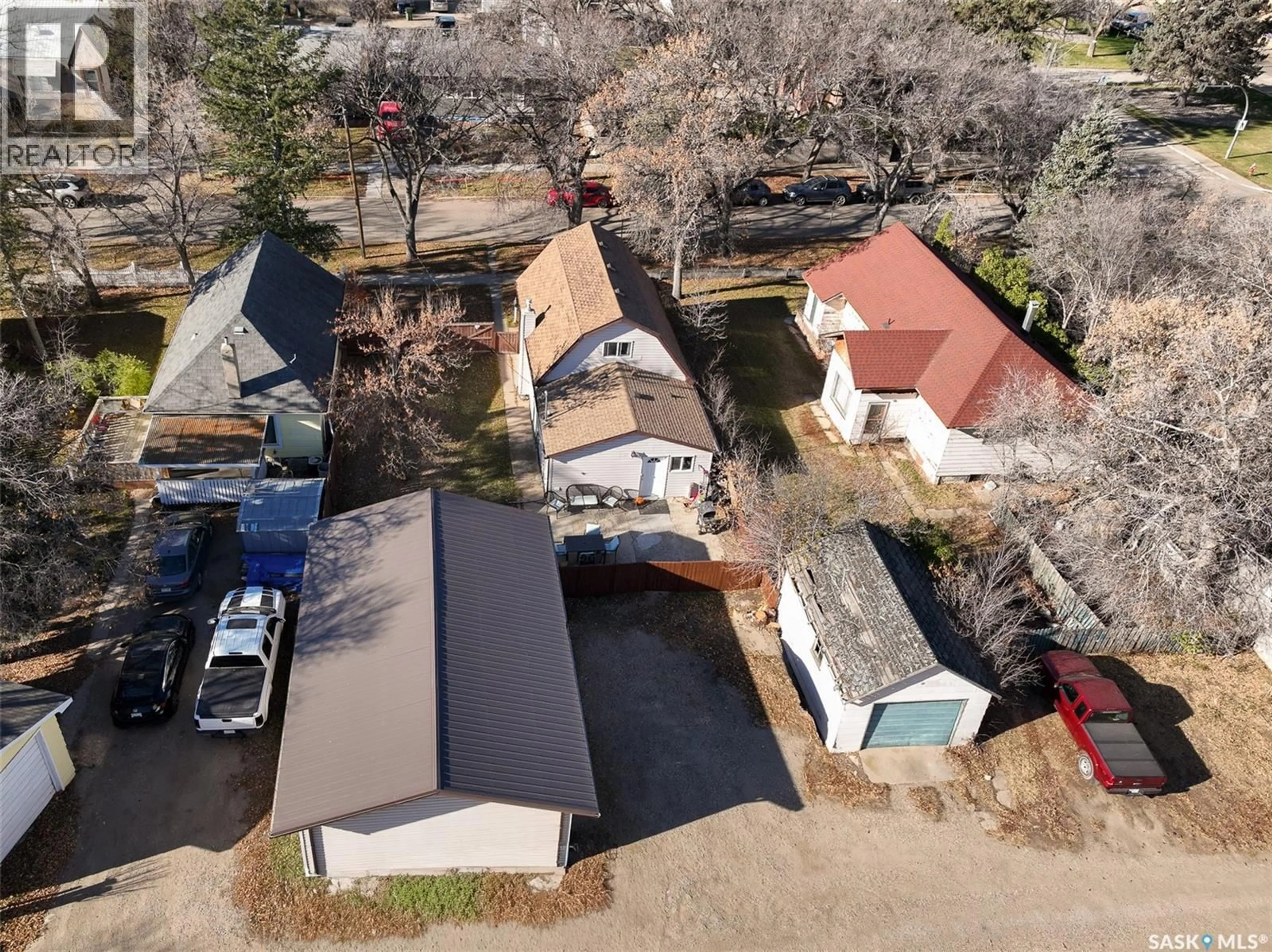 A pic from outside/outdoor area/front of a property/back of a property/a pic from drone, street for 1143 6TH AVENUE, Moose Jaw Saskatchewan S6H4A7